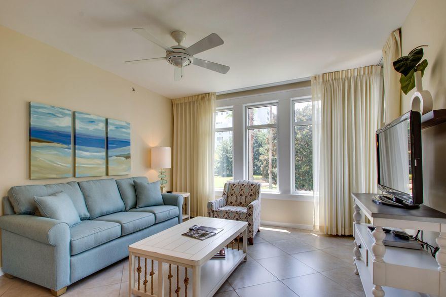 Totally renovated with BRAND NEW coastal furniture, lamps, decor, travertine tile flooring throughout, and granite counters in the kitchen & main bath! Corner condo offering a large covered balcony overlooking the Grand lawn & pool as well as views of the Choctawhatchee Bay. The master bedroom has ultimate privacy being on the end and offers wonderful Bay views! The location is prime in the heart of the Grand Complex within The Village of Baytowne Wharf, a pedestrian scenery with shops, dining, playground, live music and more. This unit is now A-rated on Sandestin Rental and has the potential for maximum rental use. It can be rented as a Studio, 1 bedroom, or as a full 2 bedroom unit. You could even keep one side personally and rent out the other. The opportunities are endless! As an introduction to the Sandestin lifestyle, we invite our new owners to explore amenities that make Sandestin special. The listing brokerage and seller(s) are presenting the buyer(s) of this property with (2) 90-minute rounds of Tennis court time, a golf foursome at one of our three championship courses, and a round of golf for up to four (4) players at the unrivaled Burnt Pine Golf Club.

Sandestin Golf and Beach Resort is a major destination for all seasons and all ages, and has been named the #1 resort on Florida's Emerald Coast. This magical resort spanning over 2,000 acres is comprised of over 70 unique neighborhoods of condominiums, villas, town homes, and estates. The resort features miles of sandy white beaches and pristine bay front, four championship golf courses, a world-class tennis center with 15 courts, 4 resort swimming pools (and 15 private neighborhood pools), a 123-slip marina, a fully equipped and professionally staffed fitness center and spa, meeting spaces and The Village of Baytowne Wharf, a charming pedestrian village with events, shopping, dining, family entertainment and nightlife. For true golf cart community living, Grand Boulevard is just outside the resort gates and provides access to additional shopping, dining and entertainment, all without traveling on Hwy. 98.  Come to Play, Stay for Life!