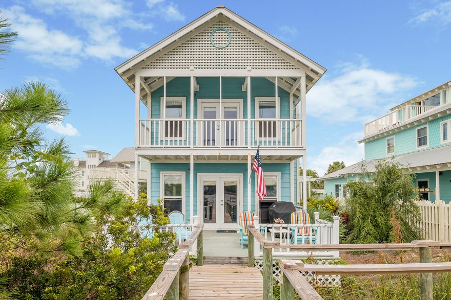 GULF VIEWS! Charming Beach home located minutes from the Gulf! Located on Oyster Lake with dock. Gorgeous views of the lake and the gulf from second and third floor. Ground floor includes one of the three bedrooms and bathrooms. Second floor features two bedrooms and baths including master bedroom. The master bedroom includes a large private porch with great views of the lake and the gulf. The third floor tower includes an additional bonus room as well as a large private sun deck to enjoy showcase views of the gulf. Beach access across the street. Stinkys, Shunk Gulley, and Gulf Place just minutes away.