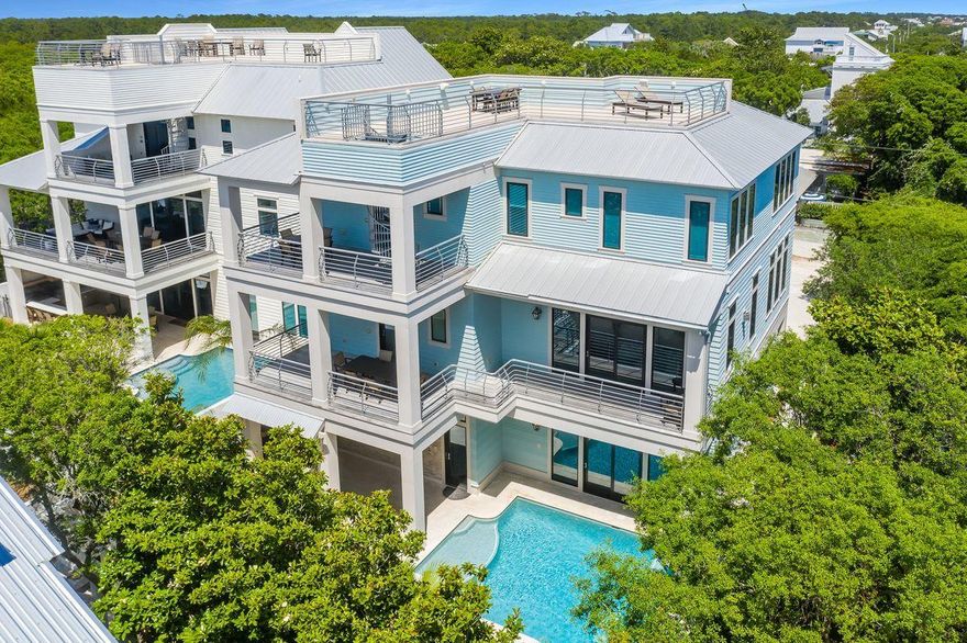 Over $378,000 of rental on the books for 2021. This unparalleled coastal retreat in Seagrove Beach features unimpeded views of the Gulf of Mexico from its position two tiers off the sugar-sand beaches of the Emerald Coast. Completed in 2017, 35 Camellia Street features seven bedrooms and eight full baths spread over more than 5,000 square feet of living space. The gulf views from multiple floors of this home are a hallmark, but just the beginning. Inside, experience an open floor plan bolstered by 12-ft. ceilings, French oak flooring and Italian porcelain tile. The first floor is anchored by an entertaining space that includes a spacious game room and common area as well as a bunk room and king suite. Easy access to the outdoor oasis can be enjoyed here, including a pool deck,