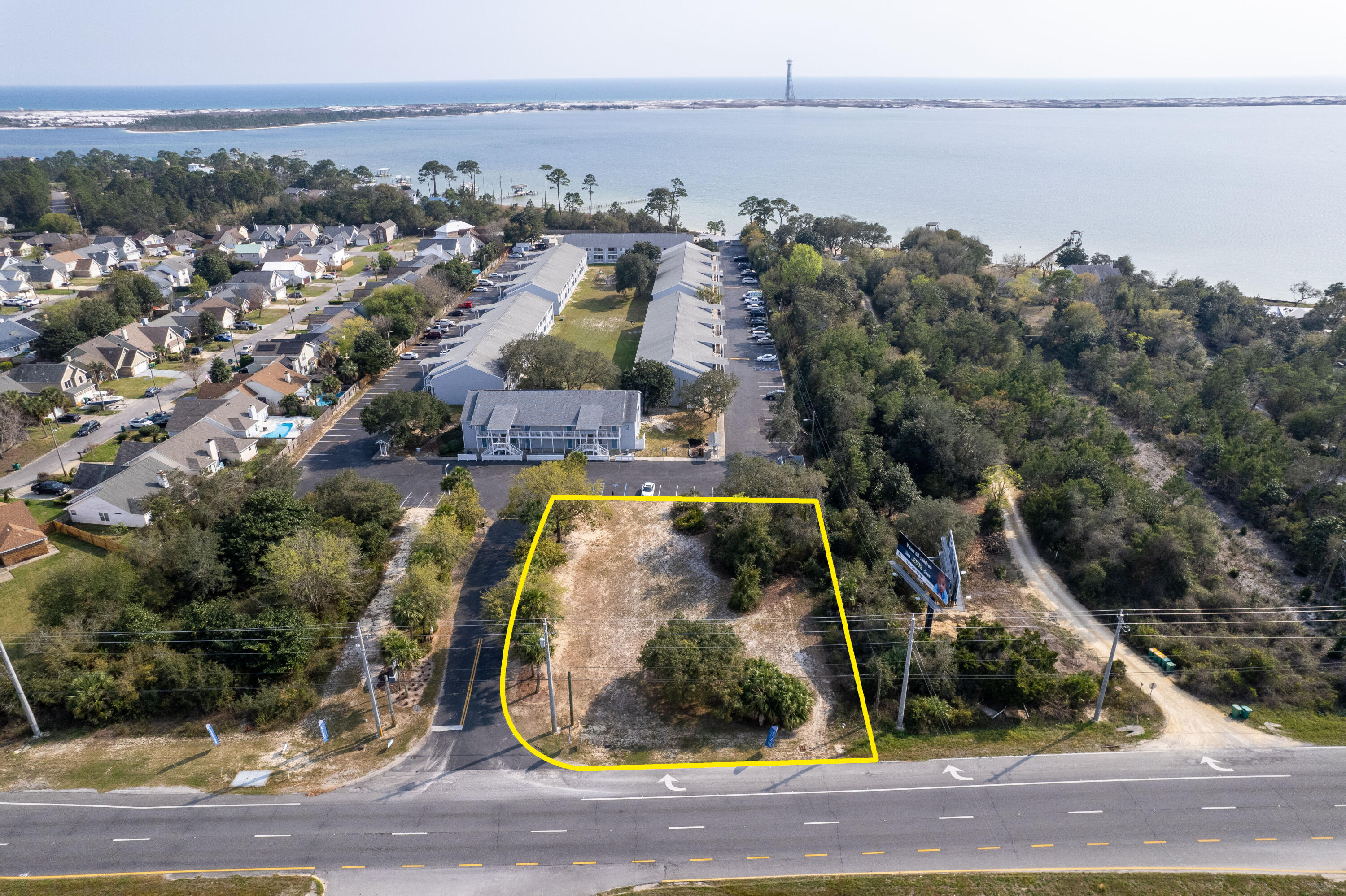 Amazing lot with highway frontage located on Hwy 98 in Mary Esther, FL. This .43 acre lot is zoned R2 which has multiple residential options - single family, duplex, triplex, etc. Centrally located between Navarre and Ft. Walton Beach (less than 10 miles) means access to plenty of shops, restaurants, schools and businesses.2nd lot available, see MLS #918901