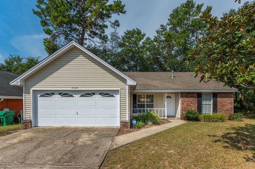 Location, location, location and it has a new roof!  This 3 bedroom, 2 bath home is located on a culdasac, close to shopping and the elementary school.  It lives larger than its 1408 sf inside with a split floor plan, eat-in kitchen, separate dining room, indoor laundry, and screened in porch.  Family room features a fireplace and opens onto the screened in porch.  Kitchen has newer stainless steel oven and dishwasher.  Owner's suite is spacious with plenty of room for a king-size bed with large closet in ensuite bathroom.  Split floorplan places the other two bedrooms and full hall bath on other side of living room. Lot is naturalized in the back for easy upkeep and peaceful backyard. House would make lovely primary home or great investment property.