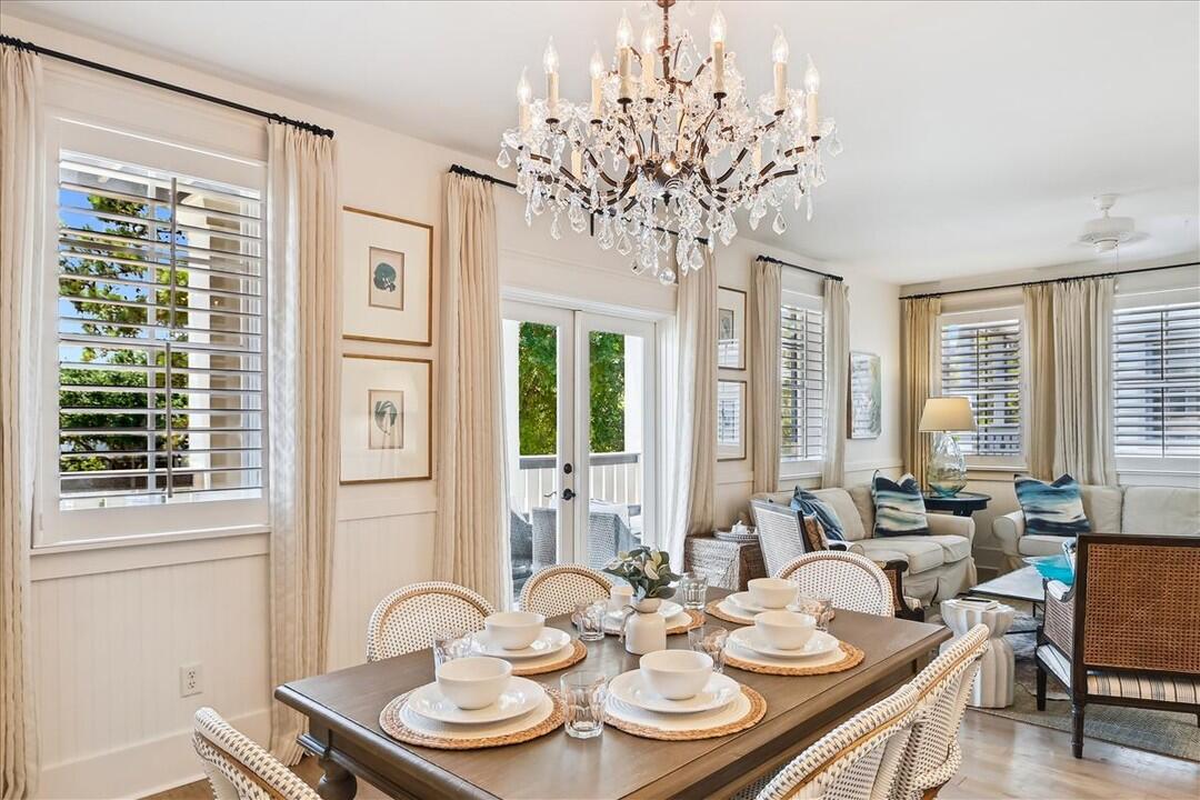 Updated by designer, Ashley Gilbreath, this large condominium offers a spacious living and dining area that spills out to your private balcony overlooking St. Augustine Green and the private owners pool and pavilion. The kitchen is outfitted with stainless steel appliances, marble countertops, and accented with a beautiful glass tile backsplash. The guest room features a queen bed and additional built-in daybed. As you head to the master bedroom, there are a set of adorable built-in bunk beds which give additional sleeping and perfect for kids. Finally, the master bedroom is adorned with a large king size bed and tastefully decorated with pinch pleat curtains and additional seating. This large master bedroom is your own oasis with a large walk-in closet and the master bath that features a walk-in shower and soaker tub. Accommodating up to 7 guests, this gorgeous unit is just a short walk from the beach, 5 different community pools, and the Rosemary Beach Town Square. Offered fully-furnished, this property comes with strong rental income potential.