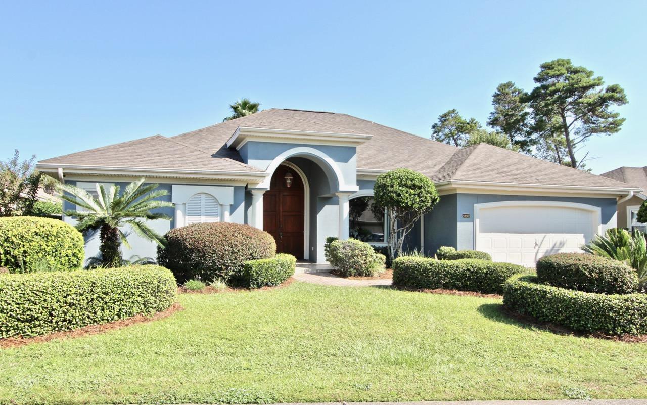 Beautiful home in Chardonnay Estates. This custom home was the Builders Model with many upgrades. Featuring the ''Merlot'' floor plan, this home has unique architectural details, 14' double tray ceilings, custom marble floors, split floor plan with 2 open living areas with a spacious feel and plenty of natural light. Both living areas offer views of the pool and beautifully landscaped back yard providing privacy to enjoy this tropical paradise. The pool features a large screened enclosure and a hot tub and is very spacious, perfect for entertaining. Other updates include: A Lennox 4-ton A/C & gas furnace, new pool pump, new dishwasher, new garage door opener with key pad, stucco repainted & sealed, repainted pool deck. Beautiful home, quiet cul-de-sac. Great location!