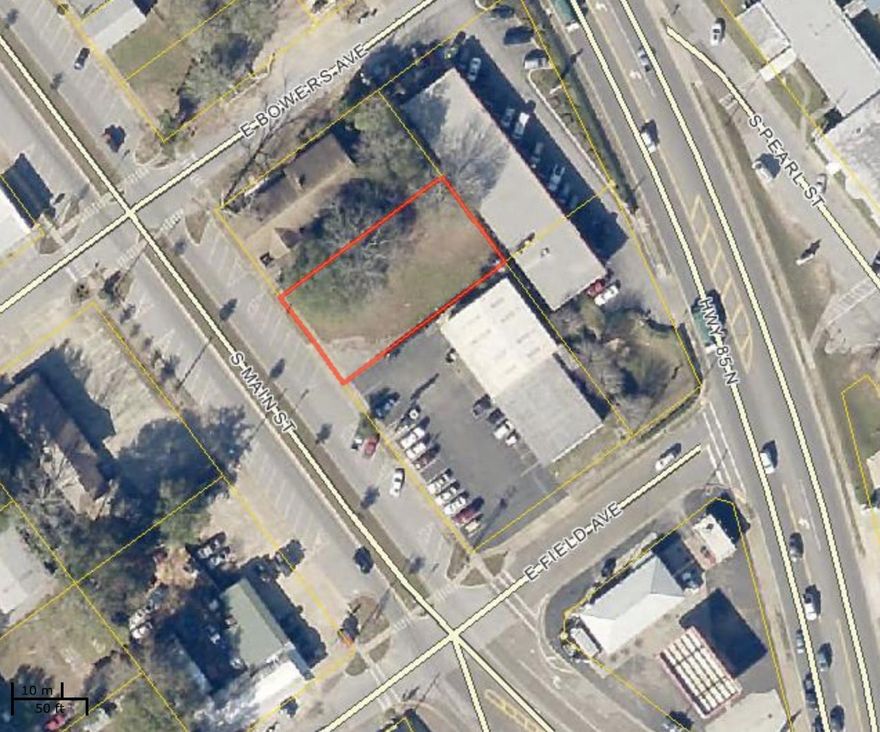 This is a vacant lot just north of Main Street Automotive. Close to the intersection of HWY 85 (Ferdon Blvd) and Main Street this property has great potential as Main street is redeveloped and more and more business are moving into the area. Great on street parking and landscaping.- Buyer to verify all important dimensions, easements, building requirements and zoning.