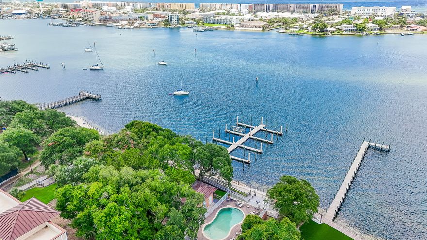 Welcome to Indianola on the Water! This spacious and move-in-ready 3-bedroom, 3-bath condo with BOATSLIP offers stunning views of the Intracoastal Waterway from its large second-floor balcony. It's the perfect place to enjoy a cup of coffee in the morning or a glass of wine in the evening. You'll feel like you're on vacation every day. Each bedroom features its own private ensuite bath, offering comfort and privacy for residents and guests alike. An open-concept kitchen is equipped with stainless steel appliances, a large breakfast bar and granite counters. Convenient in-unit washer/dryer hookups. Enjoy tile flooring in the main living areas, kitchen, and baths, with beautiful hardwood floors in the bedrooms. Relax and unwind with community amenities including waterfront access, a pool with restrooms, a sunset deck with fire pit, and a gated entry for added peace of mind. A dedicated boat slip and owner storage cage are also included. Perfectly located just minutes from Fort Walton Landing Park and the vibrant downtown area, you'll have easy access to shopping, dining, nightlife, and the sugar-white beaches of the Emerald Coast. Whether you're a boating enthusiast or simply love coastal living, this is your opportunity to own a slice of paradise. Ideal as a second home or a long-term rental investmentdon't miss out on this beautiful waterfront condo!