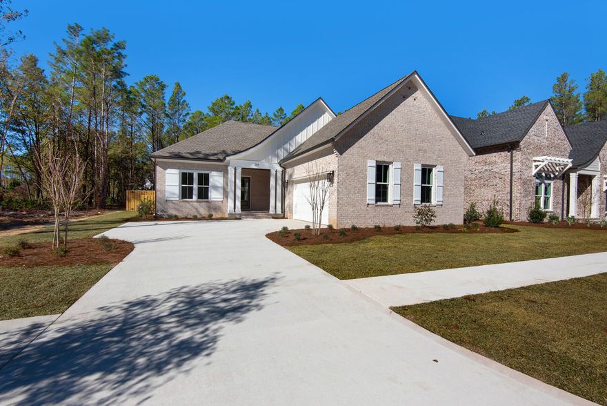 Hammock Bay's newest community - Reflection at Hammock Bay.  Featuring a gated entrance, easy access over to the Bay Club, oversized preserve lots, some backing to Bear Creek and ponds - its a limited opportunity to say the least.  The Charlotte plan by locally renowned builder features 3 bedrooms and an office on one floor.  This luxury home features wood floors in living areas and master bedroom, mudroom cabinets, Cambria quartz counter tops, furniture grade Woodharbor cabinets, gas cooktop, cabinets to the ceiling in the kitchen, farmhouse sink, custom tile work, and a refrigerator, built in oven and convection microwave.  Oversized rear covered porch to enjoy the fantastic back yard.  Rear yard will feature treed buffer with natural landscape plus sod and sprinkler