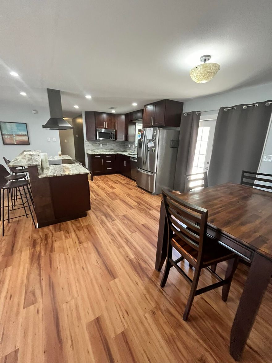 AVAILABLE NOW!!!  3 bed plus bonus room which could be used as a 4th bedroom, centrally located in Fort Walton Beach. Open floor concept great for entertaining, cooking and still being part of the family room. New wood flooring through the whole home. Easy access to shopping and dining. 4 miles to beautiful white sandy beaches. Close to Eglin AFB, Hurlburt Field and an easy 25 minute drive to 7th Group. Master bedroom has double French doors leading to the fenced backyard with storage sheds. The main bathroom has been completely renovated with new marble tile flooring, walls, custom shower and vanity.