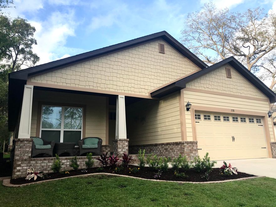 One of the only FOUR bedroom homes in all of Freeport under $300k! Just 1/2 mile from the 331/20 intersection. Close to schools, shopping, & only 20 min from the emerald waters of the Gulf Coast. Craftsman style home on cul de sac street in The Canopies! Perfect spot for the kids to ride bikes while you sit on the wide front porch and greet new neighbors. Hardiboard exterior with brick skirt, 2 car garage and large homesite that has just been partially fenced for privacy. Walking through front door you will instantly notice the vaulted ceiling and wide- open layout of 228 Jakes Way. Drop your bags/ shoes at the custom built- in just inside the door. Flex space currently being used as a kid's area but could be used in so many ways- a formal dining, office, hobby area.