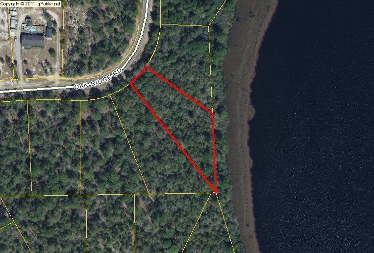 Check out this 1.135 acre waterfront lot on Juniper Lake! Lot is located in the north east section of Juniper lake that is less populated for more seclusion and privacy. This lot provides you with 248 Feet right on the water! Clear this property and build you a beautiful lake front home.