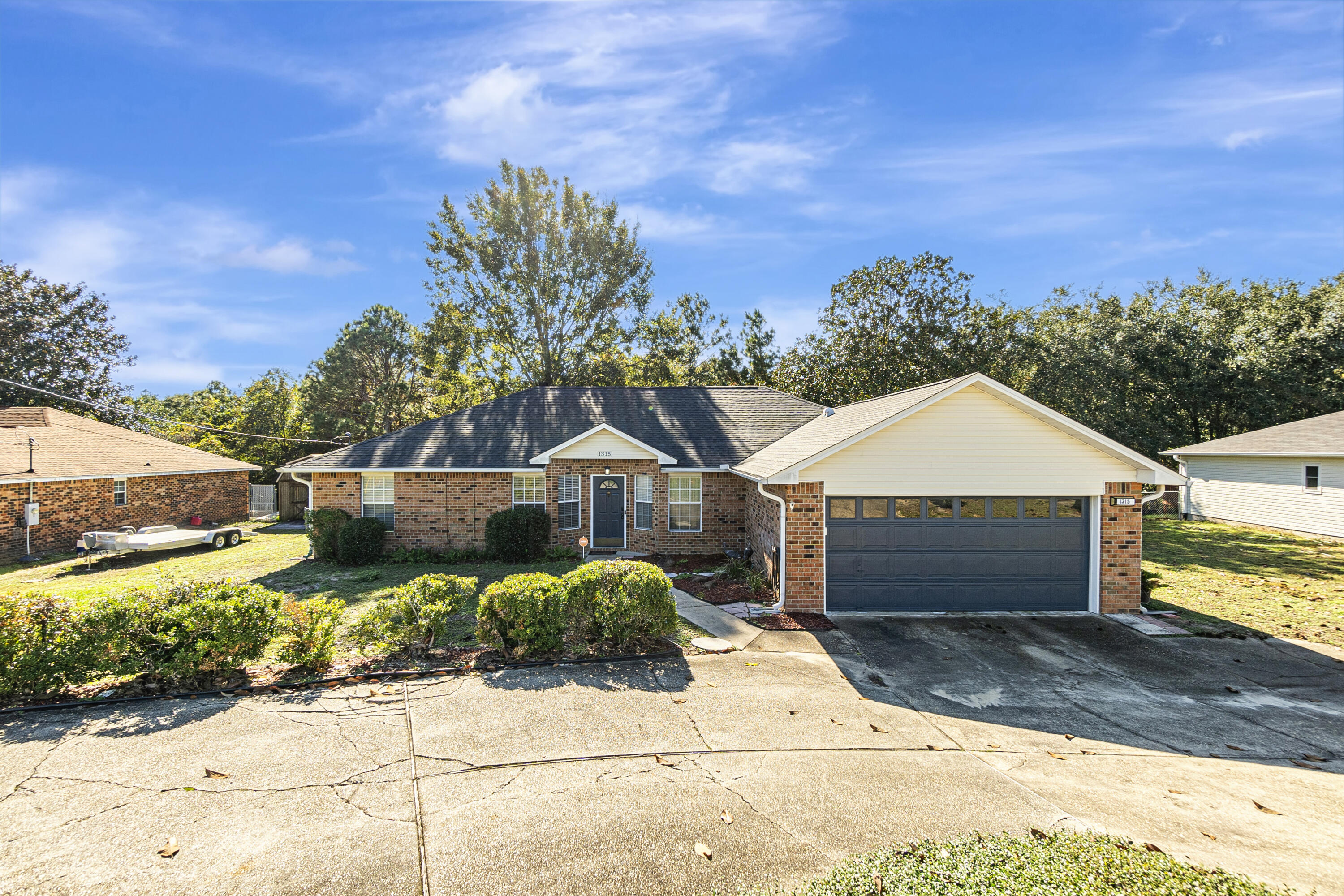 Nestled in the desirable Countyview Estates neighborhood of South Crestview, this well-maintained 3-bedroom, 2-bath ranch home offers 1,816 square feet of inviting living space. Whether you're looking for comfort, style, or practicality, this home has it all, making it an ideal rental for families or those who love to entertain. Upon arrival, you'll appreciate the rare double entrance driveway, providing ample parking and easy access. Inside, the home boasts an open concept layout with high ceilings and an abundance of natural light that creates a welcoming atmosphere. The spacious living room flows into a beautifully updated kitchen, featuring stainless steel appliances, sleek granite countertops and backsplash. A cozy breakfast nook is perfect for casual meals, while the formal dining area offers an elegant space for hosting dinner parties or special occasions. The home also includes a versatile flex room, which can be used as a home office, playroom, or additional living spaceperfect for whatever your needs may be.

Throughout the home, you'll find stylish travertine tile flooring, oil-rubbed bronze lighting, fixtures, and hardware that add a touch of elegance to each room. The private master suite is a true retreat, offering an ensuite bathroom with double vanities, a separate tub and shower, and spacious his-and-her walk-in closets. Two additional generously sized bedrooms provide plenty of space for family or guests, while the second bathroom has been updated with a modern vanity and fixtures.

Step outside to the expansive backyard, perfect for relaxing or entertaining. Enjoy the serene views from the large new deck, surrounded by mature trees and plenty of room for outdoor activities or hosting BBQs.

This home is move-in ready with numerous upgrades, including a new roof, AC unit, water heater, and a full-home water softening system. Located just south of I-10, you'll have easy access to shopping, dining, and other amenities in Crestview.

Don't miss out on this beautiful rental opportunityschedule a showing today and make this charming home yours!

**24 hour notice required for showings**