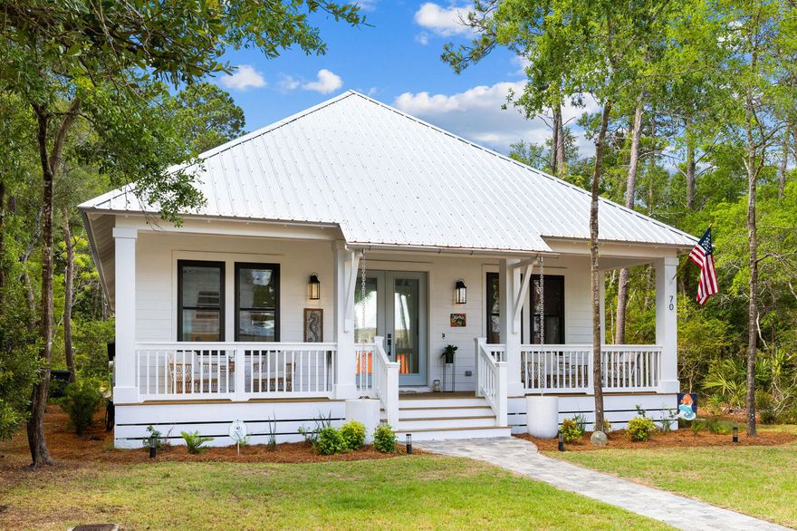 Experience luxurious Florida Cottage living mere moments from the Choctawhatchee Bay, the community pool, and less than four quick miles to the Gulf of Mexico! This 3BR/2.5BA + bonus room and two-car garage residence in Grayton Bayou emanates charm from every corner and was carefully crafted to provide the perfect blend of elegance and comfort. The spacious, open-concept design creates a seamless flow between rooms perfect for both entertainment and relaxation. Notice the attention to detail and use of high-quality finishes throughout including vinyl floors, custom millwork, beveled glass kitchen cabinetry, designer lighting, intricately tiled bathrooms, and much more. No short-term rentals permitted. Grayton Bayou features a swimming pool with hot tub and and a dock on the bay. The gorgeous kitchen offers quartz counters including a large island, a subway tile backsplash, easy glide drawers, soft close cabinets, LG Black stainless appliances, and a ZLINE under counter microwave. A serene retreat, the master suite features a stunning ensuite with separate soaking tub, large walk-in shower with glass wall, and a double vanity. The two additional guest rooms are adjoined by a jack and jill-style bathroom with double vanity. The bonus room can function however needed most, easily becoming an office, playroom, or home gym. Outside, the back-entry two-car garage provides additional storage and covered parking while the welcoming front porch is an ideal place to gather and soak up the warm gulf breeze. An outdoor shower makes cleaning up easy after a beach day and the flowerpot rain gutters on the front porch add additional charm. Additional notable features include hardiboard siding, a metal roof, meticulously wrapped rafters, a foam sprayed interior, a moisture controlled, high-efficiency air conditioning system, and a Santa Fe Merv 13 Home Dehumidifier creating pure, clean air quality. A rarely found combination of quality, function, style, and convenience make this home a must see!