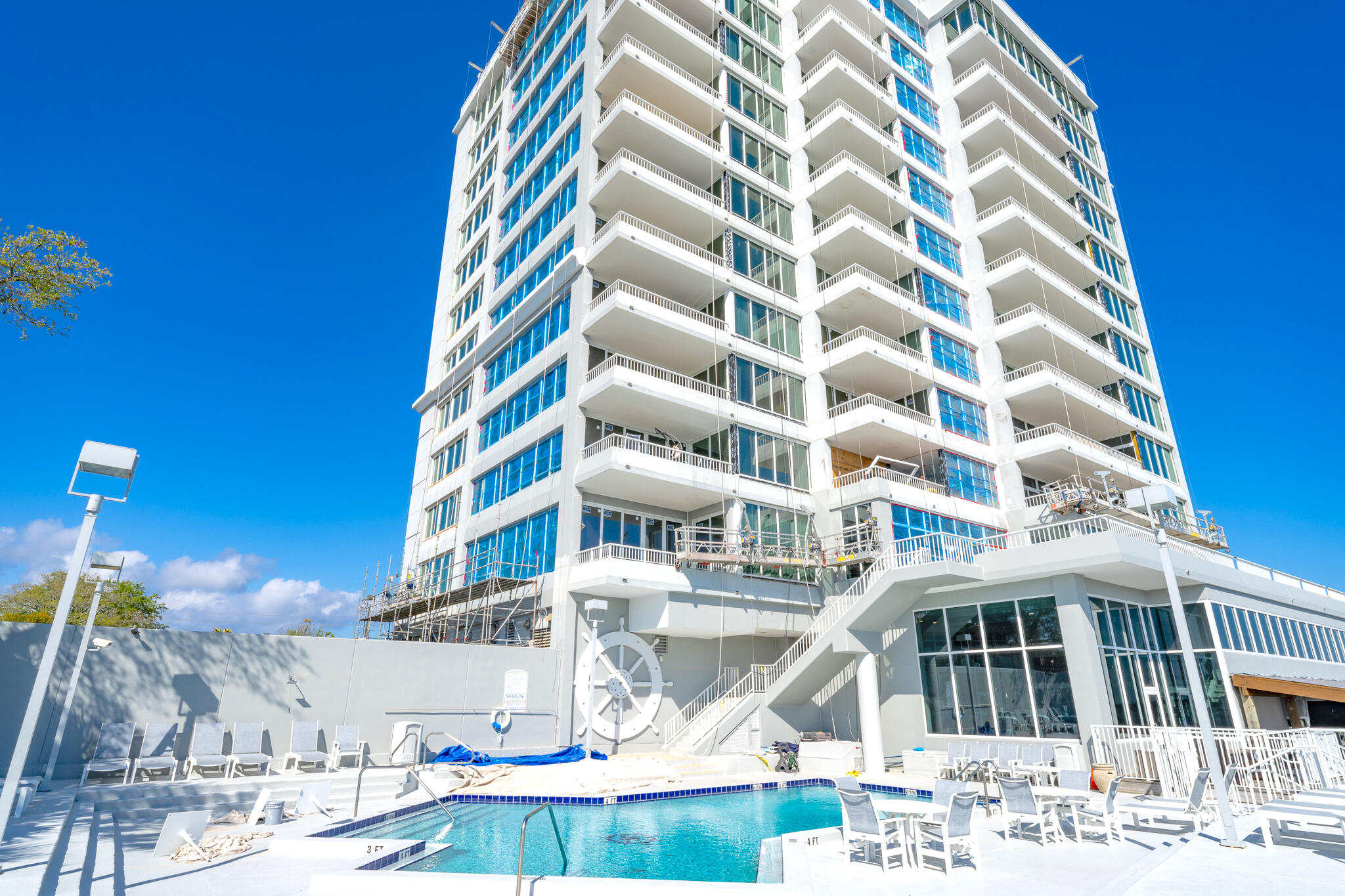 Welcome to the luxurious Destin Yacht Club, an exclusive gated coastal condominium complex nestled in the heart of Destin. This coastal paradise offers an unrivaled location, just a stone's throw away from all the vibrant activities and attractions of the Destin Harbor. Imagine sipping a glass of champagne from your private balcony as you marvel at the spectacular weekly firework shows illuminating the night sky. Beyond the gates, a world of local eateries, charming shoppes, and lively festivals awaits you on the enchanting boardwalk.Prepare to be captivated by the opulent East end condo, an epitome of sophistication and refinement. Indulge in the privilege of owning a private boat slip complete with a lift, granting you seamless access to the shimmering waters. From this privileged vantage point, you can revel in breathtaking panoramic views that encompass the majestic Gulf of Mexico, the bustling Destin Harbor, and the picturesque East Pass. The condo's open concept design is a testament to modern luxury, boasting soaring 12' ceilings and an expanse of floor-to-ceiling windows that bathe the interior in an abundance of natural light. Every detail has been carefully considered, with meticulous attention lavished upon the exquisite finishes throughout.
A haven of comfort and tranquility, this East end condo offers three spacious bedrooms and three tastefully appointed bathrooms. The master suite, located in the West wing, exudes elegance and serenity. Retreat to this private sanctuary and savor direct access to the covered balcony, where you can immerse yourself in the refreshing sea breeze and soak in the stunning vistas. The master suite is thoughtfully separated from the East wing, where the guest bedrooms and bathrooms are discreetly tucked away, ensuring optimal privacy and convenience for both residents and visitors.
Prepare to be enthralled by the sheer opulence and grandeur that awaits you at the Destin Yacht Club. Step into a world of unparalleled luxury, where the grand entrance sets the tone for an extraordinary living experience. Immerse yourself in the harmonious melodies resonating from the baby grand piano, creating an atmosphere of elegance and refinement. Stay in peak physical condition at the state-of-the-art fitness center, or indulge in moments of relaxation and camaraderie in the stylish social gathering spaces. For those seeking entertainment, the game room offers a haven for friendly competition, while the dedicated children's room ensures that young ones are always entertained and engaged.
Step outside into a world of recreational bliss. The marina beckons avid boaters to set sail and explore the endless wonders of the coast. A dedicated dog park ensures that even your four-legged companions can revel in the luxurious lifestyle offered by the Destin Yacht Club. Dive into the inviting swimming pool, bask in the sun-drenched pool deck, and let your cares melt away in this oasis of serenity.
The condo itself boasts recent updates that elevate it to the pinnacle of modern design and functionality. The air conditioning system, less than two years old, ensures optimal comfort year-round. The updated appliances, cabinets, counters, and flooring seamlessly blend contemporary aesthetics with timeless elegance. Additionally, a stunning Bio flame fireplace serves as a captivating centerpiece, infusing warmth and ambiance into the living space.
Envision yourself living in this captivating East end condo, where every detail has been meticulously curated to create a harmonious blend of luxury, comfort, and style. Don't miss the opportunity to make this stunning condo your own. Contact your favorite realtor?? today and embark on a journey to discover the epitome of coastal living at the Destin Yacht Club.