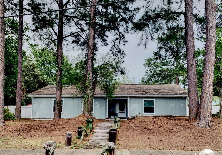 Updated 3 bedroom, 2 bath home with two large living spaces. Situated on a .31 acre corner lot, this home features an in-ground swimming pool (new pool liner and pool curbing coming soon) and has been recently renovated. The spacious living room includes lovely brick fireplace and new flooring. The large kitchen has new cabinets, new countertops, new appliances and more. The converted garage makes a wonderful, second living space or can be used as a 4th bedroom. The master bedroom, also with a great fireplace, has new carpet and a newly updated bathroom. Both the 2nd and 3rd bedroom have new carpet and they share an updated second bath. There is a nice sized laundry room off the kitchen as well. Outside you'll find a large backyard with an in ground swimming pool.