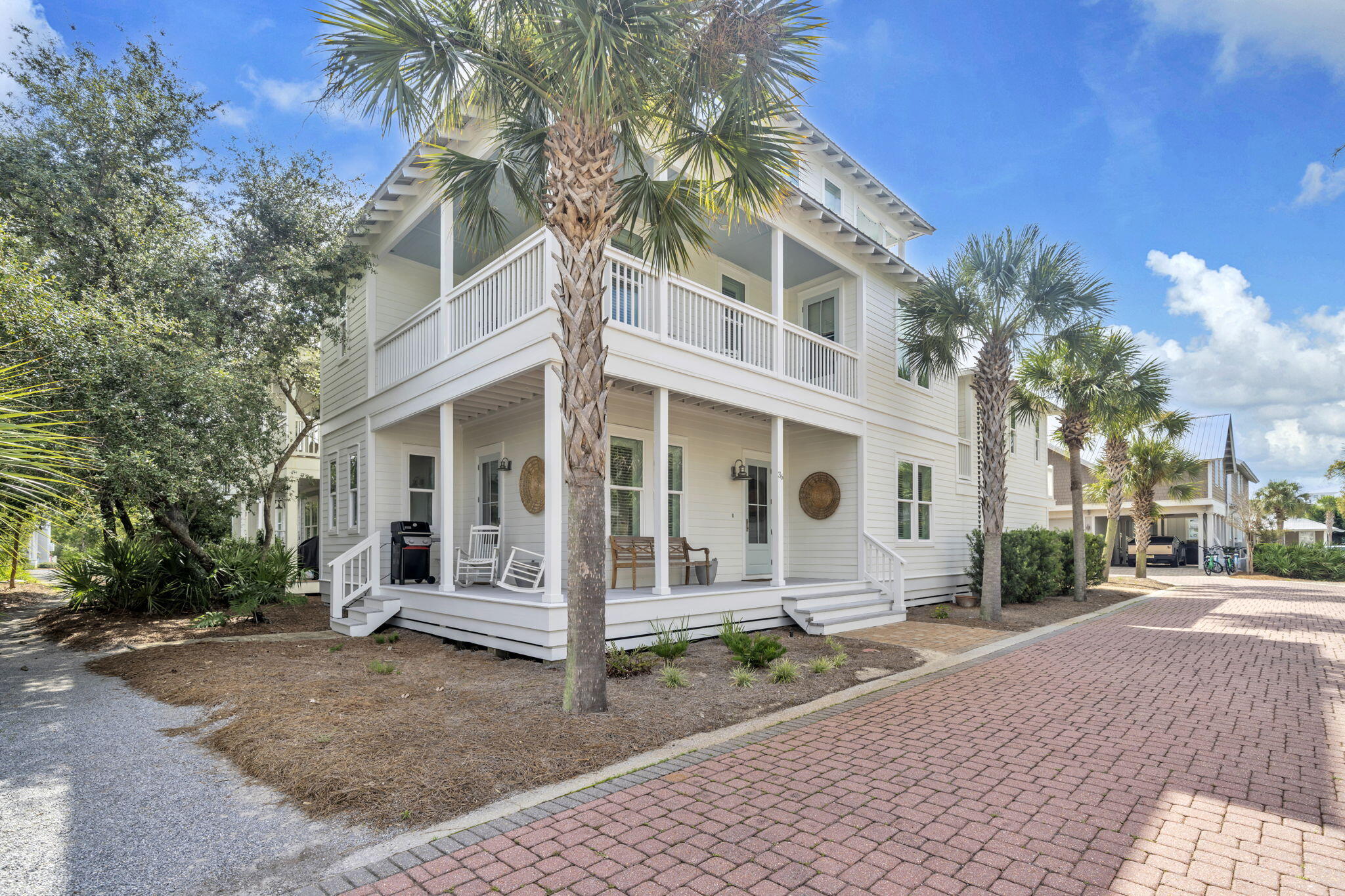 Nestled in the sought-after Seacrest Beach Subdivision, this beautiful beach house offers deeded beach access to the sugar white sands and crystalline green waters of the Emerald Coast. Recently refreshed with a crisp white exterior and sea-glass aqua accents, the home radiates coastal charm. A spacious wraparound porch provides the perfect spot for relaxing or entertaining. Additional highlights include a rare double car garage and a carriage house. Inside, the open-concept floor plan is ideal for gatherings. The kitchen boasts a large pantry breakfast bar, dining area and stainless steel appliances. Throughout the home, you'll find new LVP flooring, updated light fixtures, and a bright, airy feel. The first floor features a spacious bedroom, full bath and laundry closet. Upstairs, the primary suite easily accommodates a king-sized bed and offers a spa-like bath with a soaking tub and a separate shower. The second floor also includes a guest bedroom and a charming bunk room with 4 bunk beds. On the third floor, enjoy beautiful views from the deck, along with a half bath and additional bedroom. Pride of ownership is evident in this property. Owner upgrades include a recently purchased Main house Air Handler and Heat Pump, Carriage House Air Handler and Heat Pump and Main house line set. Beyond the home the community offers a 378,000 gallon pool which is one of the largest private pools in the state of Florida and is open year-round from 9 am-9:45pm for Seacrest residents and guests. The amphitheater is a grassy area where concerts, movies, and weddings are held It is also great for a pick-up game of Bocce or Frisbee throwing. From March - October, the Seacrest Tram service offers transportation to and from the designated tram stops in the neighborhood to the beach or the Lagoon pool.
One of the newest additions to the community is the Seacrest Beach Caf?? operated by Crust Artisan Bakery. The Caf?? is located on the east side of the lagoon and features a delectable menu that is not your typical pool-side snack shack. They have seafood baskets, the classics such as chicken fingers and burgers, po-boys and sandwiches as well as a satisfying kids menu. Additionally, the surrounding area has great shopping, world class golf courses for the golfing enthusiasts and an abundance of restaurants ranging from casual beachfront cafes to fine dining all complemented by stunning gulf sunsets!! What are you waiting for? Call me to schedule a showing of this fabulous property and community!!!
