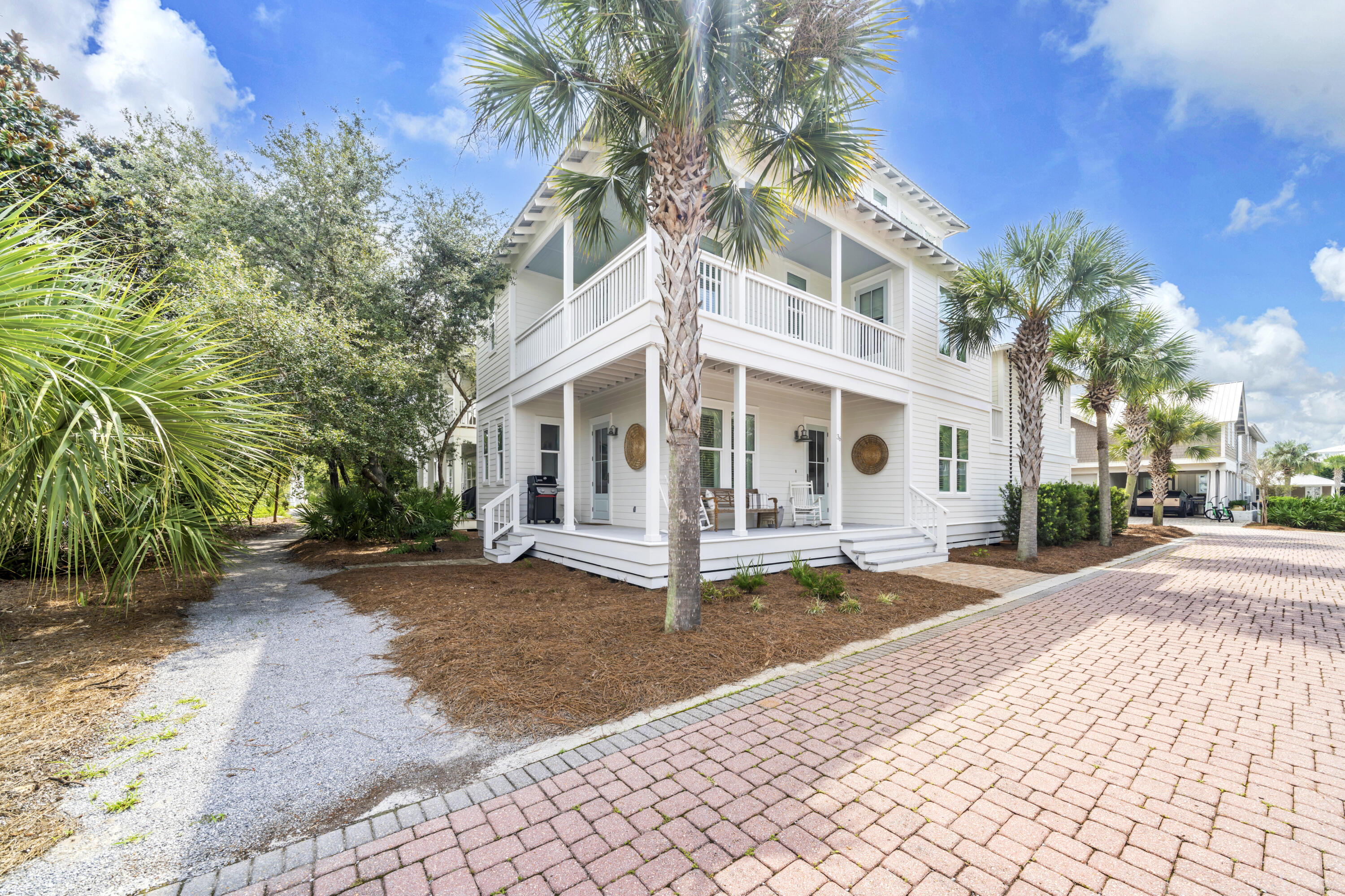 Nestled in the sought-after Seacrest Beach Subdivision, this beautiful beach house offers deeded beach access to the sugar white sands and crystalline green waters of the Emerald Coast. Recently refreshed with a crisp white exterior and sea-glass aqua accents, the home radiates coastal charm. A spacious wraparound porch provides the perfect spot for relaxing or entertaining. Additional highlights include a rare double car garage and a carriage house. Inside, the open-concept floor plan is ideal for gatherings. The kitchen boasts a large pantry breakfast bar, dining area and stainless steel appliances. Throughout the home, you'll find new LVP flooring, updated light fixtures, and a bright, airy feel. The first floor features a spacious bedroom, full bath and laundry closet. Upstairs, the primary suite easily accommodates a king-sized bed and offers a spa-like bath with a soaking tub and a separate shower. The second floor also includes a guest bedroom and a charming bunk room with 4 bunk beds. On the third floor, enjoy beautiful views from the deck, along with a half bath and additional bedroom. Pride of ownership is evident in this property. Owner upgrades include a recently purchased Main house Air Handler and Heat Pump, Carriage House Air Handler and Heat Pump and Main house line set. Beyond the home the community offers a 378,000 gallon pool which is one of the largest private pools in the state of Florida and is open year-round from 9 am-9:45pm for Seacrest residents and guests. The amphitheater is a grassy area where concerts, movies, and weddings are held It is also great for a pick-up game of Bocce or Frisbee throwing. From March - October, the Seacrest Tram service offers transportation to and from the designated tram stops in the neighborhood to the beach or the Lagoon pool.
One of the newest additions to the community is the Seacrest Beach Caf?? operated by Crust Artisan Bakery. The Caf?? is located on the east side of the lagoon and features a delectable menu that is not your typical pool-side snack shack. They have seafood baskets, the classics such as chicken fingers and burgers, po-boys and sandwiches as well as a satisfying kids menu. Additionally, the surrounding area has great shopping, world class golf courses for the golfing enthusiasts and an abundance of restaurants ranging from casual beachfront cafes to fine dining all complemented by stunning gulf sunsets!! What are you waiting for? Buyer to verify all lot and home dimensions. Call me to schedule a showing of this fabulous property and community!!!