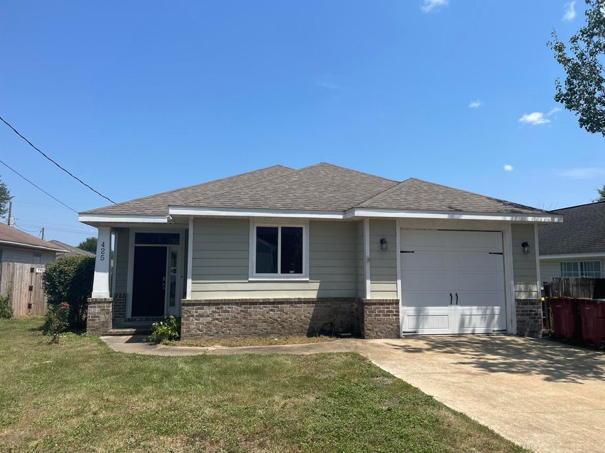 ADORABLE Craftsman style home SOUTH of I10-minutes from bases and a short trip to the beaches! Laminate, tile, and carpet flooring. Home features granite countertops and kitchen is totally open to the living room, giving a true ''great'' room feel! Small enclosed porch leads to a fully fence back yard with storage building. All new blinds being installed.