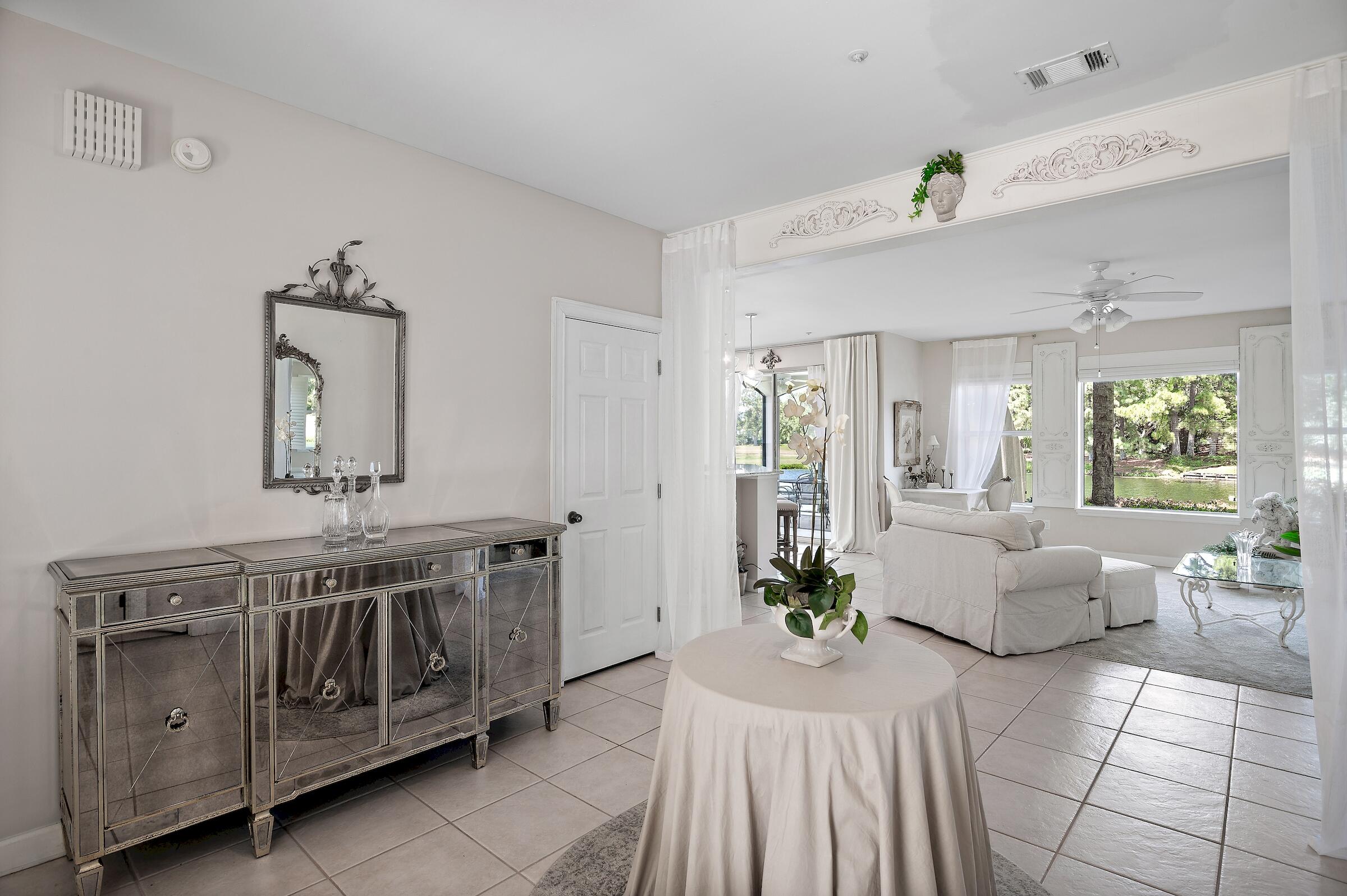 Discover this precious retreat nestled in the Sandestin Golf & Beach Resort(r). This pristine, elegantly furnished condo offers stunning views from every room. The open floor plan flows into a stylish living area, gourmet kitchen and picturesque dining nook. The serene master suite features an en-suite bath, while additional bedrooms provide comfort and tranquil views too! Enjoy the screened porch, perfect for relaxation & alfresco dining. Like to fish? The lake is catch & release, and the bay with marina is just a 3 minute golf cart ride+ tennis, pickleball, restaurants, & live entertainment!Residents enjoy world-class amenities, including golf courses, a private beach, pools, tennis, marina, dining & more. Short-term rentals are allowed. Don't miss this exceptional opportunity.