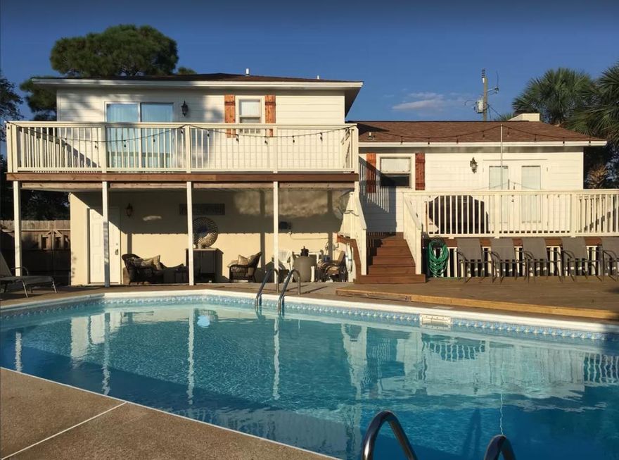 Destin Remodeled! Looking for Your Paradise Retreat? This ''Close to Everything'' Destin Pool Home IS IT! Just a short hop to the Public Beach Access by The Back Porch Restaurant. Walk or Ride your Bike to the Dog Park or Sports Complex. Close to Destin Commons and Entertainment! BEAUTIFULLY Remodeled Home will make you say WOW. Main Living Area with Fireplace is open to the Kitchen and Dining. Split Level allows for Lower Level Room to be used as a Bedroom, Theater Space, Office or Playroom. Enjoy the Fenced Yard and Pool Views from the Back Balcony. Deck off the Kitchen / Dining perfect fr a Cook-Out. This home is being sold Furnished! It's a Must See! Buyer to verify all measurements.