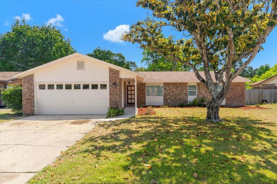 Move-In Ready Gem in Fort Walton Beach! Welcome to 725 Dubois Drive -a beautifully updated home offering a spacious open floor plan and modern finishes throughout. Step inside to find LVP flooring throughout, a wood-burning fireplace for cozy evenings, and an abundance of natural light from a large bay window. The kitchen is a chef's dream with sleek new cabinets, granite countertops, and stainless steel appliances. This home also features a large fenced backyard perfect for entertaining or relaxing outdoors, and a two-car garage for ample storage. Located in the center of town this home is just minutes from both base entrances, grocery stores and most restaurant options. Major updates include a roof (2015), new windows (2018), water heater (2019), and all wood siding redone in 2024.