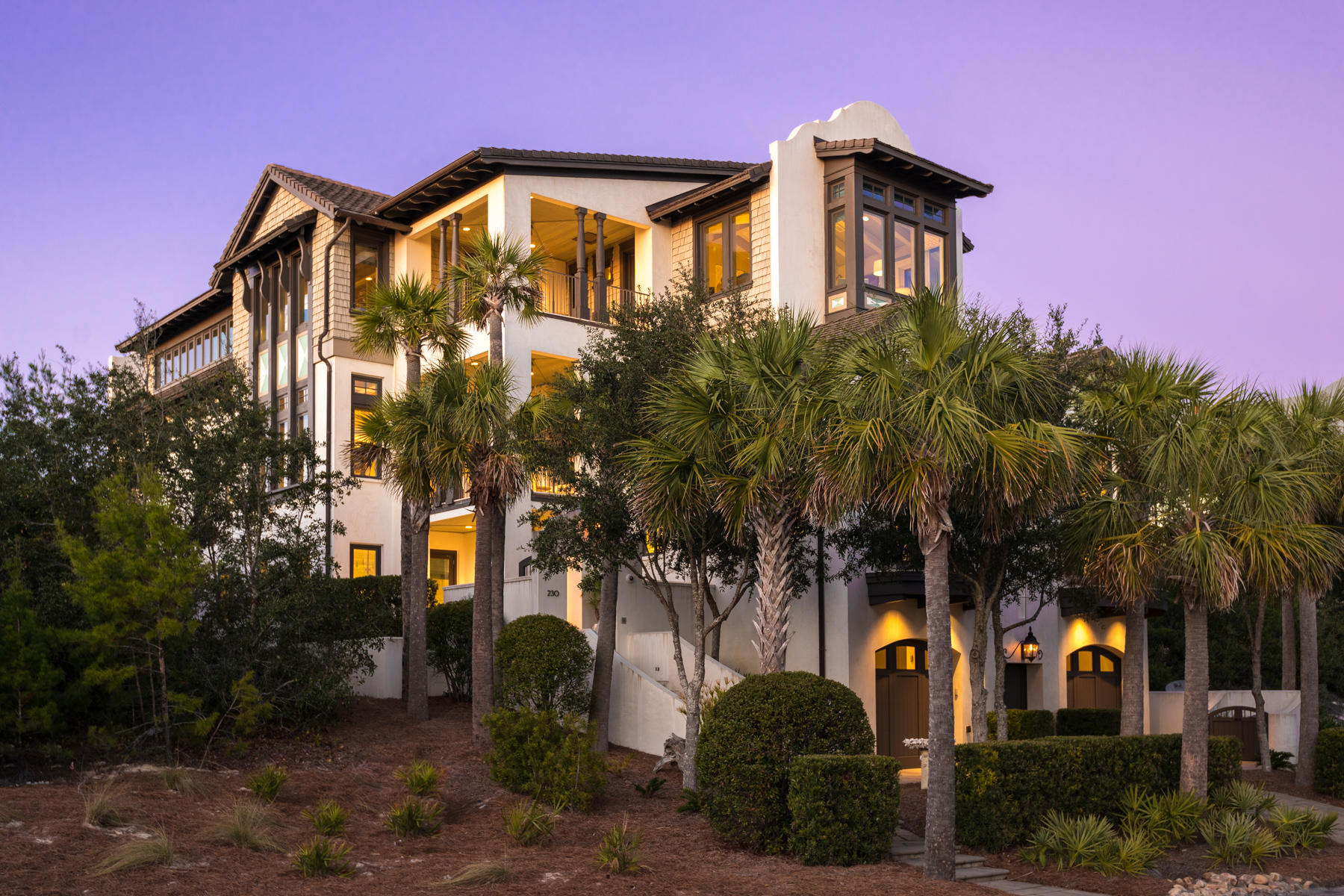 A Dutch Caribbean style villa, with exquisite interior appointments, stunning design and a lakefront lot in one of the most coveted private communities on 30A. Built in The Retreat, this home is styled with parapet walls and a smooth stucco coating over the cement block exterior. Step into the private courtyard entrance and be enveloped in breathtaking finishes, stunning detail and meticulous planning that went into creating this beach manor. Distinctive floor and ceiling treatments of marble, Tabby stone, stone tile, Oak and a scissor-truss cathedral ceiling inspire grace and grandeur.