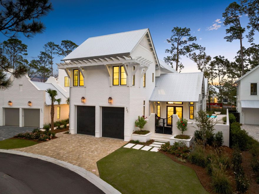 Under Contract, accepting Back-up Offers. This stunning residence in the prestigious waterfront community of Churchill Oaks perfectly balances luxury living with coastal charm off 30A. Designed for both elegance and entertainment, this light-filled home features a two-car garage, private pool, and two primary suites. Soaring 12-foot ceilings and expansive 10-foot Euro-wall sliders create a seamless flow between the living room and outdoor spaces. The first floor's living area showcases exquisite Venetian plaster walls and white oak flooring, creating an atmosphere of refined sophistication that complements its natural surroundings. The heart of the home is its chef-inspired kitchen and dining space, where a lengthy buffet/wet bar with refrigerators ensures drinks are perfectly chilled for any occasion. The kitchen itself is a masterpiece of design, featuring professional-grade appliances including a 48-inch Wolf dual-fuel range with griddle and a 48-inch Sub-Zero refrigerator. A fully equipped butler's pantry makes entertaining effortless, while honed marble countertops with a dramatic 6cm island add a touch of understated luxury. The main-floor primary suite offers a peaceful retreat, complete with a vaulted ceiling and a spa-like bathroom featuring a deep soaker tub and dual vanities. French doors open directly to the L-shaped plunge pool, while nearby trails beckon for morning strolls.

Upstairs, the second floor is an entertainer's dream with its spacious great room and wet bar. The second primary suite on this level rivals the first, boasting a generous walk-in closet with custom storage and a screened balcony perfect for enjoying morning coffee and birdsong. Its luxurious bathroom features a sophisticated wet room design with both a shower and standalone garden tub.


The outdoor living space is equally impressive, with a low-maintenance AstroTurf yard surrounding the private pool. A thoughtfully designed entertainment area centers around a cozy fire pit, while the outdoor kitchen - complete with built-in refrigerator, sink, and grill - makes alfresco dining a joy. Churchill Oaks stands out as one of the select communities north of 30A, offering residents access to a private marina just steps away, along with a clubhouse and infinity-edge pool overlooking the bayou. Beyond the community gates, world-class beaches, fine dining, and boutique shopping are all within easy reach.