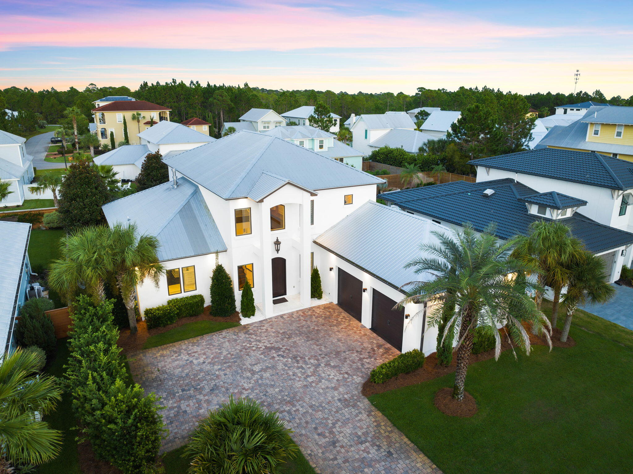 Sophisticated design combined with superior construction greet you upon entry of this west 30A home. Situated in the gated community of Cypress Breeze, the features of this custom-built home are truly endless. The property seamlessly integrates professional design with luxury amenities and stylish selections. Premium materials paired with a well-thought-through floor-plan create a timeless design to be enjoyed for generations to come. As you enter through the grand foyer, soaring ceilings draw attention to a beautiful staircase. Flowing directly from the great room, the living space is created for gathering and entertaining. The space is highlighted by the stunning gas fireplace. From the living, an elegant dining room showcases a taste of the gorgeous lighting found in the home.