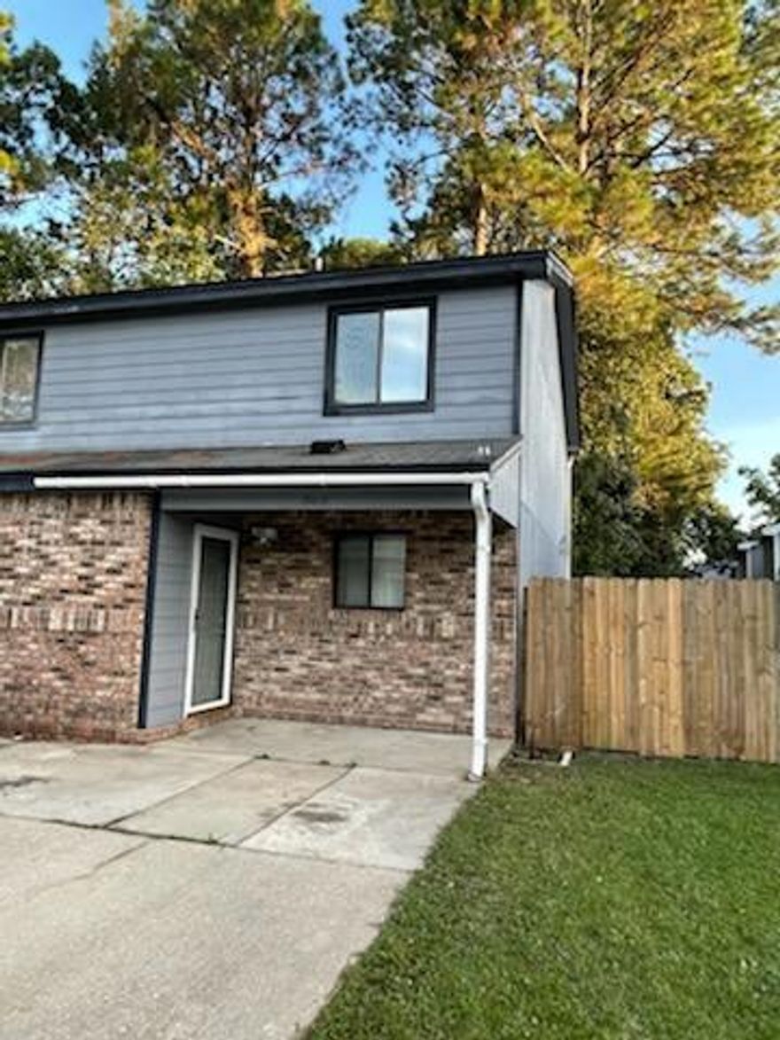 Great Investment Opportunity – this 2 bedroom townhome has much to offer. Must see to appreciate, new paint and carpet throughout, bedrooms and full bath located on the second floor, kitchen, living/dining room with half bath and utility room on the first floor. Access your fenced in patio through your large sliding glass door off the living area. Excellent location - near military bases, amazing beaches, downtown area and local hospital. No Home Owners Association. Yard building sold as is