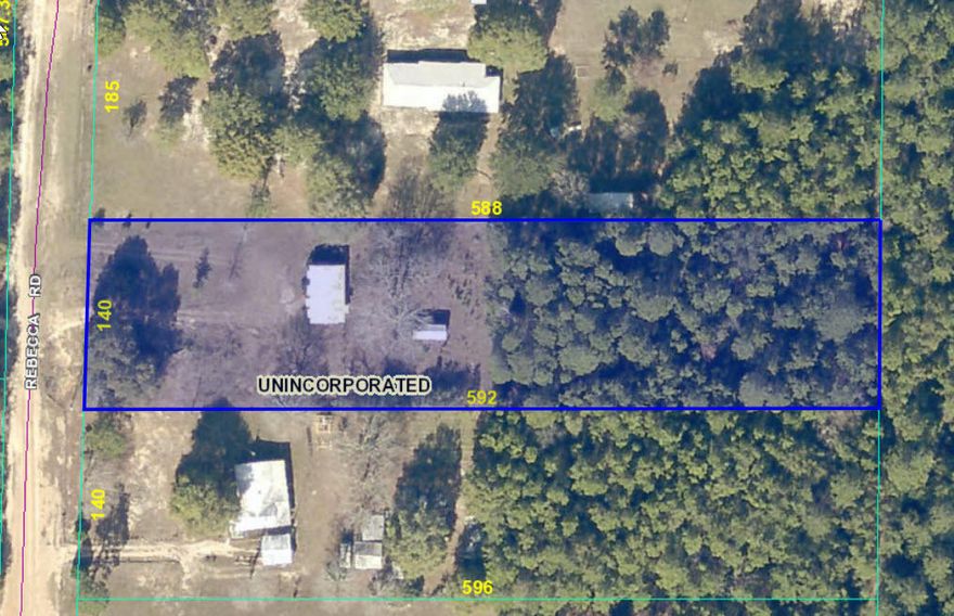 Welcome to quiet, country living! This spacious lot has mature tree, septic, water, and power already in place. The perfect spot for your dream home on nearly 2 acres of property. There is a manufactured home on property that needs to be removed and no value has been given to it. Call today to see this lot!
