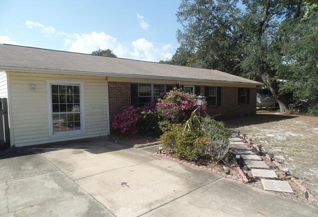 REO ~ Awesome Corner Lot w/ In-ground Pool... This 3 Bd / 1.5 Ba home is situated in the heart of Destin & offers lots potential. The interior of the home features tile floors through out, converted garage may be used as office or extra living space & eat-in kitchen. Enjoy entertaining in your large back yard with pool & patio. Don't miss out on all this home has to offer.