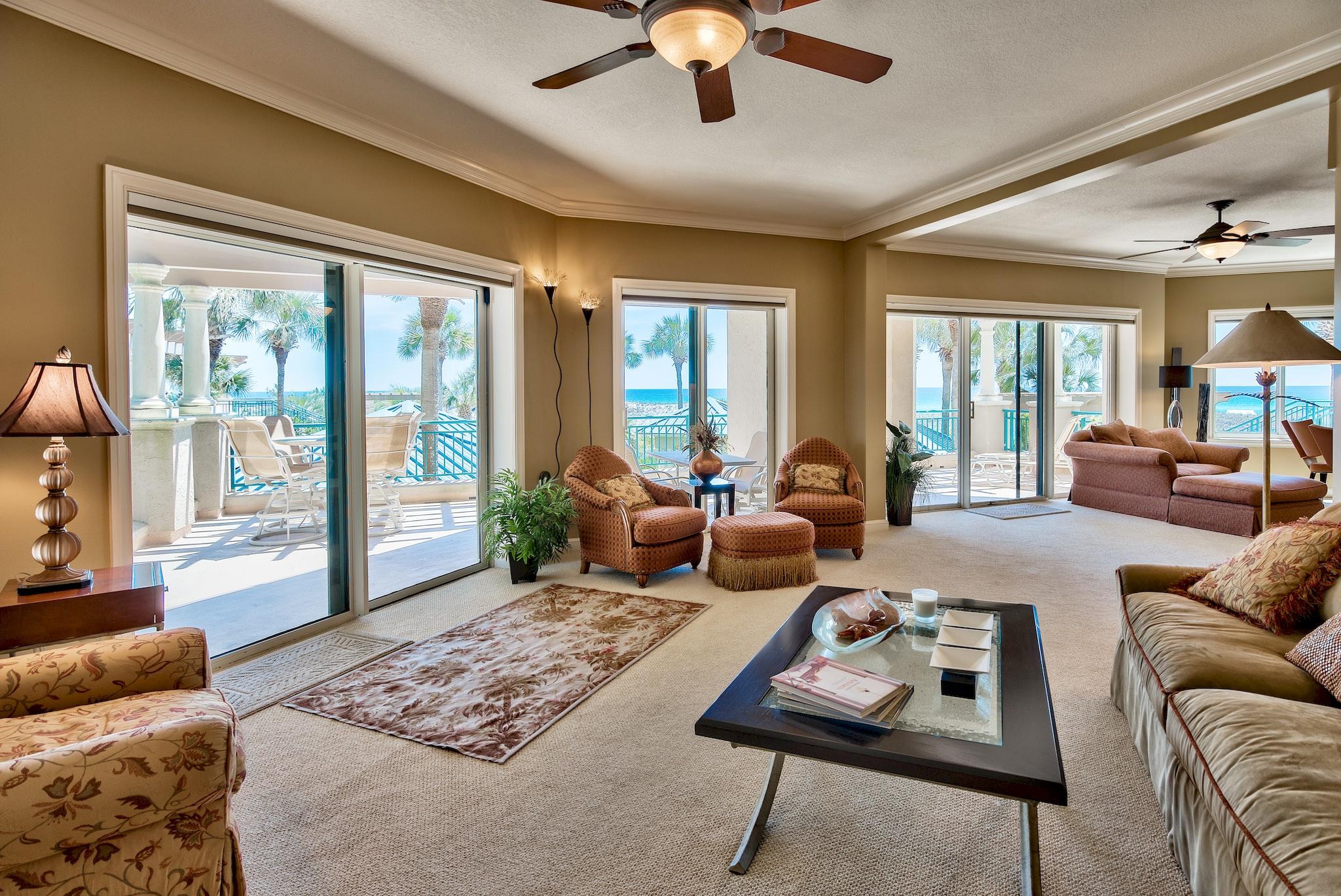 Unique opportunity to own a sprawling 4 bedroom, 4.5 bathroom, 2 story, 3484 sf condo with incredible gulf views. This spacious condo features two kitchens - one traditional and one for entertaining, four large bedrooms - two upstairs, two downstairs and each with their own en suite bathroom, a large balcony and a large covered patio off the two downstairs bedrooms. Both stories are situated on the courtyard and pool levels, so no elevators are necessary and you have the convenience of taking your pet right out your private door. This amazing condo would be a great place for entertaining, relaxing or just your home away from home.
