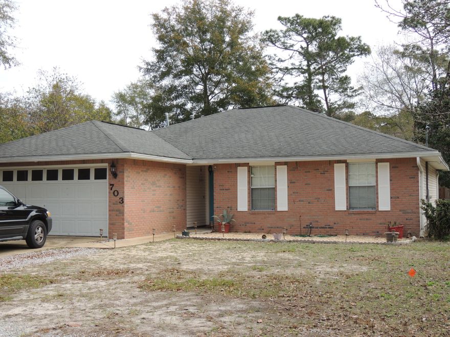 Come in thru the beautiful leaded glass front door to over 2100 sq. ft. of light and bright living, thanks to oversized windows and an open floor plan. Cooks kitchen with all NEW appliances including gas stove, plenty of cabinets and lots of counter space. Seller installed NEW gas HVAC system in 2012 with special electronic allergy filters. The living room has gas fireplace with mantel, and kitchen is open to both living room and family room. Conveniently close to schools and Eglin AFB, this property sits on a large privacy fenced lot, with decorative pavered back patio and good sized private yard for play. Clean, affordable, and with plenty of room for all since this home had a great room and 4th bedroom addition in 2003. The great room has true old weathered wood inlaid on the tray
