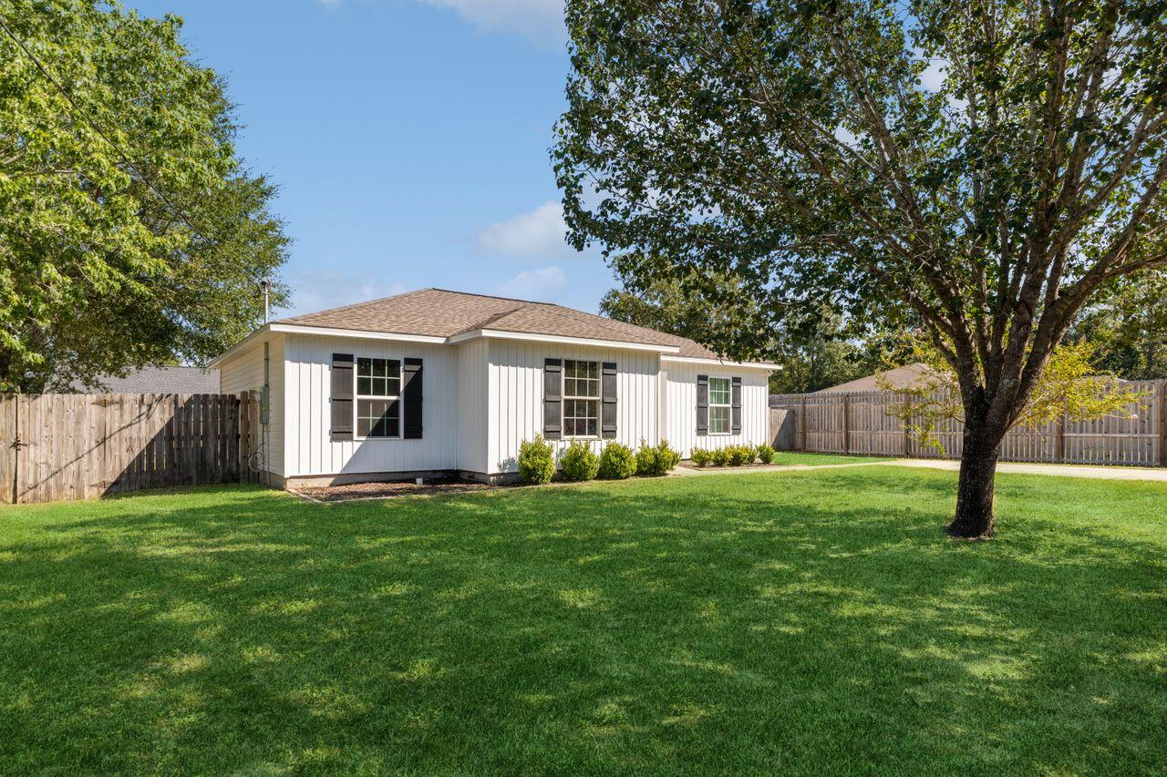 You won't want to miss this cozy Crestview home completely full of upgrades! Gray shaker cabinets, white quartz countertops, stainless steel appliances, and LVP throughout the living room and bathrooms (all updated in 2021) make this home completely move-in ready. Other 2021 updates include the roof, hot water heater, wiring, plumbing, light fixtures, and more! Located on a corner lot of a quiet street, this home boasts the perfect opportunity to enjoy a relaxing evening in the large backyard. Conveniently located to Eglin AFB, Duke Field, and 7th SFG.