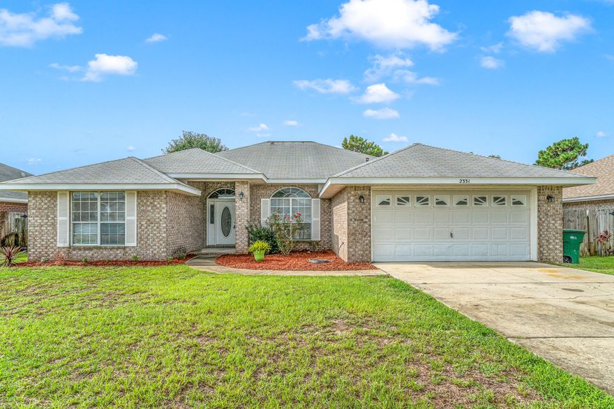 Light, airy, and updated with a POOL! This Navarre gem is a beautiful brick home, with the perfect layout, tall grand ceilings, an in-ground pool, PRIVACY FENCE, and sprinkler system w/ lawn pump. GRANITE in the kitchen with a **light, bright, open** feel. Less than 5 minutes from shopping and restaurants. Only 10 minutes from the beautiful Navarre Beach, and about 12 minutes to Hurlburt's front gate! You will not want to miss the opportunity to own this PERSONAL OASIS that's literally close to EVERYTHING!!--