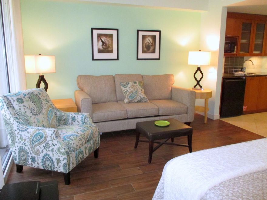 Spacious L-Floorplan, ground floor studio with large walk-out patio. Not your cookie-cutter shotgun studio  offset bedroom area makes it feel more like a one bedroom. Patio & exterior space is rare in a building where studios don't have balconies. Fabulous proximity to the beautiful Lagoon Pool but just far enough away for privacy. Exterior access is very convenient & private with NO neighbors on either side. Freshly painted & updated furnishings. Underground parking & owner's storage. A rated on the Sandestin rental program w/good rental history. Fabulous location with easy access to the Village @ Baytowne Wharf, Grand Conference Center, the Marina & Tennis Center. Full access to Grand complex amenities which include the private Solstice Club, fitness center and lagoon pool.