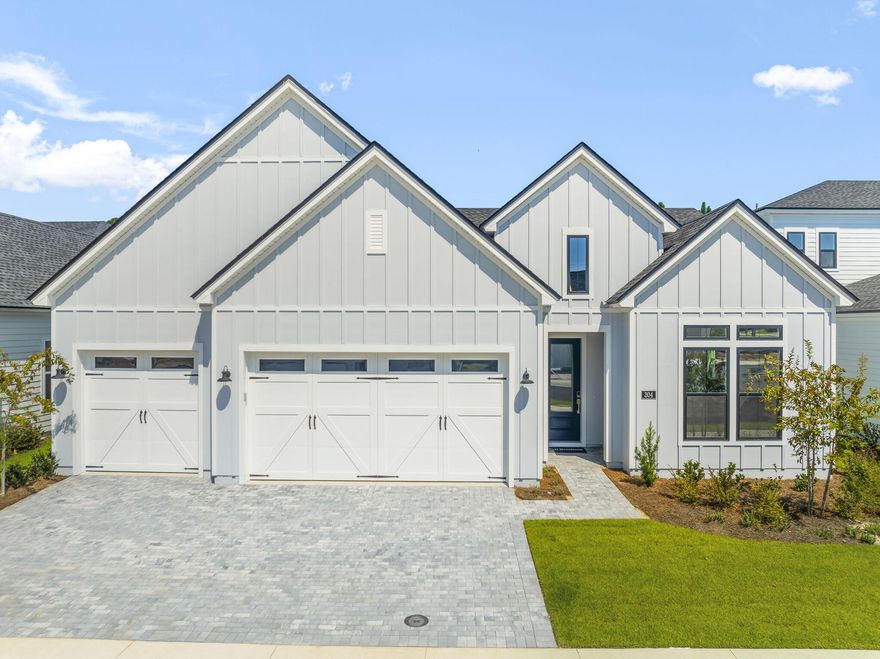 Stunning single-story 3 car garage home, offering 2,839 square feet of living space. Boasting 4 spacious bedrooms, office/flex room and 3.5 beautifully appointed bathrooms, this residence exudes elegance and comfort at every turn. The expansive open floor plan includes a private office room, perfect for working from home, and a three-car garage with a stylish paver driveway. Step into the heart of the home, the gourmet open kitchen. Here, you'll find exquisite quartz countertops, a sleek tile backsplash, and stainless steel appliances, making it ideal for both cooking and entertaining. Throughout the home, luxury vinyl plank flooring creates a seamless flow, while the bathrooms feature elegant tile finishes. The primary suite is a true retreat, with two walk-in closets offering ample storage space and an en-suite bathroom designed to pamper with a spa-like atmosphere large soaking tub and walk-in tile shower. The soaring 12-foot ceilings in the grand foyer set the tone for the home's grandeur, with 10-foot ceilings throughout the rest of the living areas, adding to the airy and open feel. Enjoy outdoor living on the covered paver lanai, which overlooks a serene private wooded preserve, providing the ultimate in peace and privacy. The beautiful gated community enhances your lifestyle, offering easy access to a variety of amenities including a resort-style pool, clubhouse, fitness center, tennis and pickleball courts, playground, multi-purpose field, and much more. Short drive to public beach access, Pier Park shopping, dining and fun entertainment, airport, future FSU/TMH medical campus, future West Bay Center with Publix, and recreation outdoor activities at Frank Brown Park. This home is more than just a place to live; it's a lifestyle waiting to be embraced. Schedule a tour now and lets start your new home journey. Construction complete available for quick move-in.