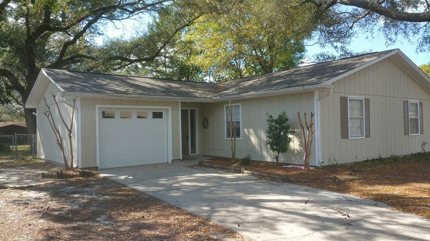 NEW ROOF!!! Totally renovated kitchen to include new espresso cabinetry, granite countertops, and stainless steel appliances (excludes refrigerator). 3br and 2 bath home. Fireplace in family room, New sliding glass door leads onto patio and huge fully fenced backyard. Spacious storage building *not warranted). Home has been completely repainted outside. Yards have been professionally cleaned. Move in ready!! Wonderful location near college and bases. Motivated Seller!
