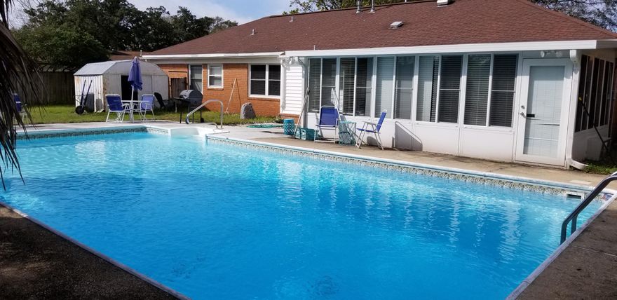 3 Bedroom/2 Bath POOL home in the highly sought-after Kenwood Subdivision in Fort Walton Beach, FL! This is the home you have been waiting for! There is NO CARPET in this home! Granite countertops, crown molding, Pergo & tile flooring throughout, 2 living rooms, Gas fireplace w/ stone surround, plus a heated & cooled Florida Room leads to the 20x40 (9ft deep) pool with Privacy fenced backyard! Don't forget to check out the feature sheet! Call for more info & to schedule your private showing!