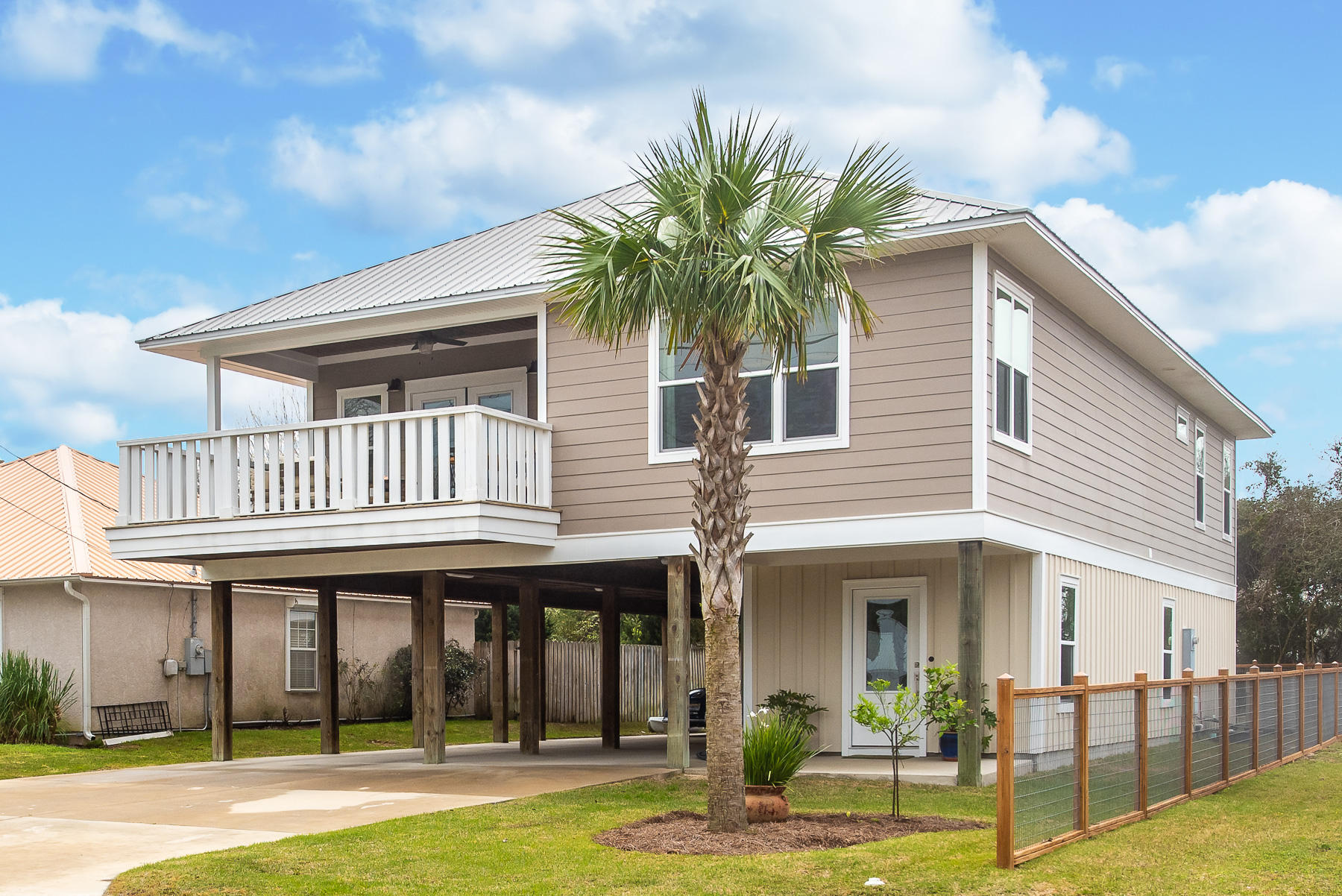 Under Contract with 72 hour kick out!Immaculate offering one block from the Gulf on the highly desirable West end of Panama City Beach. Custom built in 2013, you will find high end finishes throughout the home including brick floors on the first level, a cypress kitchen island, quartz countertops in the kitchen and bathrooms, wood ceiling accents and beautiful tile work in the bathrooms. The home's 3 bedrooms, kitchen and main living areas are on the second level. The master suite has 3 closets and a fabulous walk in shower with dual shower heads. On the first level, enjoy a spacious entry, half bath and a study/den. Inside and out, storage is abound! Under the home are huge closets, a massive workroom, an outdoor shower and parking for 5 cars and as many more in the driveway.