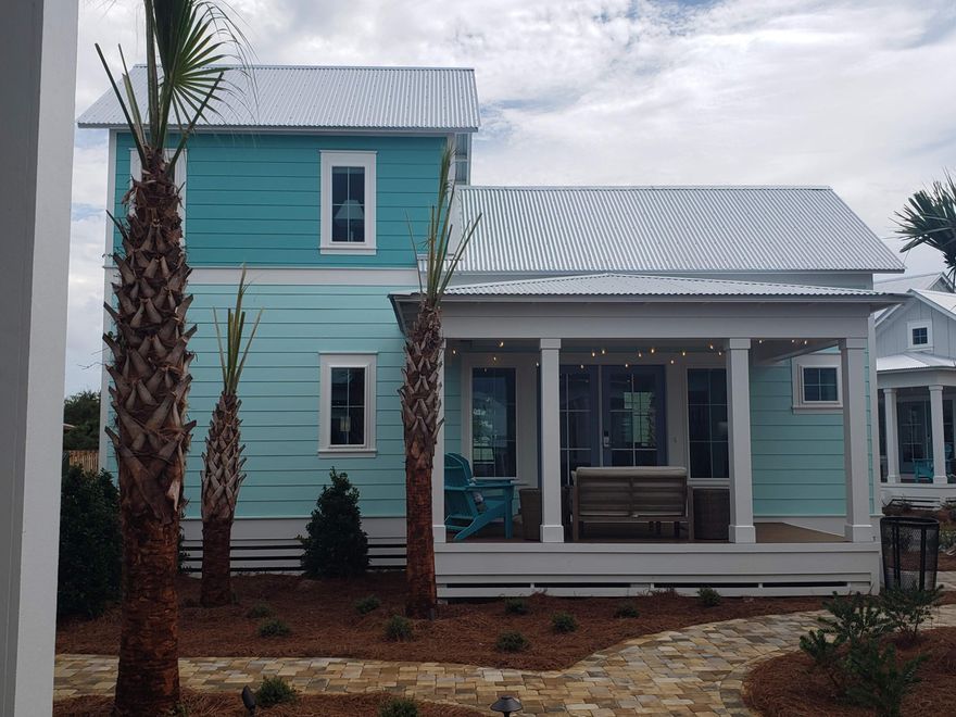 Be among the first to discover this thoughtfully curated and efficiently designed home in a charming ''surf village'' at Margaritaville Beach Cottage Resort in Panama City Beach. The Surf's Up plan lets you connect and gather on your side porch or step inside to explore 760 sf of heated/cooled space perfectly designed to fit your every need. These charming tiny homes feature a bedroom with a king bed and bath on the first floor and a sleeping loft with built-in full over full bunk beds on the 2nd level.