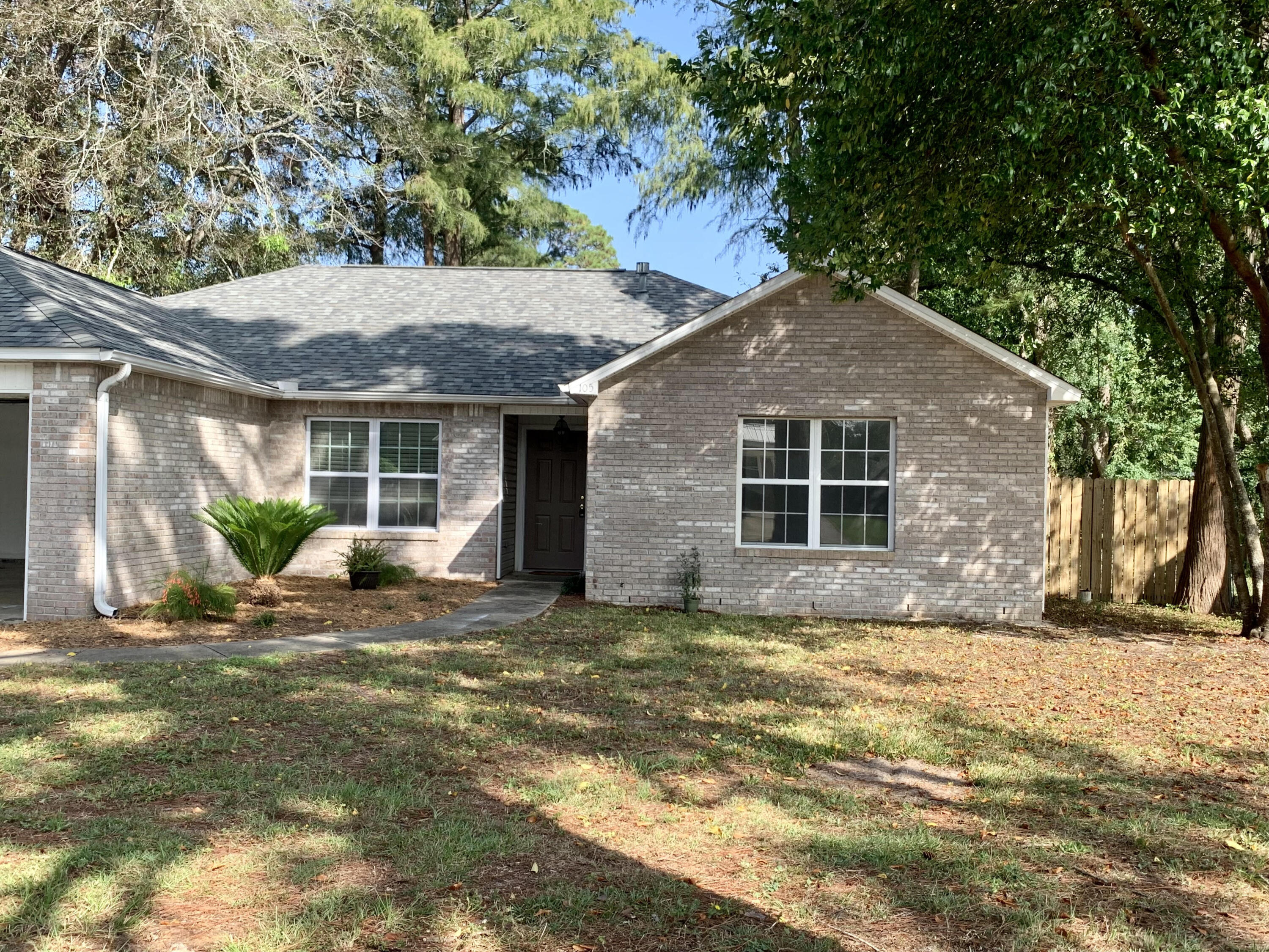 Centrally located,  this spacious 4-bedroom, 2-bathroom home  has new paint throughout, new floors in master bath and kitchen, new gas stove and fenced back yard, 2-car garage with large driveway for additional parking.  The split-bedroom floor plan provides privacy and convenience for all residents. The home features a gas fireplace, with a breakfast nook area, and does have vinyl and tile for easy clean up.  The kitchen is equipped with a new gas stove/oven, refrigerator with ice maker, dishwasher, garbage disposal, making meal preparation a breeze. For added convenience, a washer/dryer is included as is. Step outside and enjoy the fenced backyard.  Don't miss out on this incredible opportunity to make this Fort Walton Beach your long-term home sweet home!