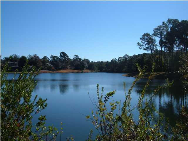 Sparkling lake front lot in Bluewater Bay's best kept secret. With a new price and look: The lot was just cleared of brush, has been surveyed and is ready to be built upon. Located on one of the largest lakes in the development this lot awaits the home builder who wants it all... value, serenity and beautiful lake views all within a small, friendly neighborhood with leisure's offerings at your back door: tennis and golf, marina, walking trails, pools, and dining. Close to hospitals, schools and military bases. Just a few minutes' drive to the sandy white beaches of the Emerald Coast and fine dining and entertainment in Destin.