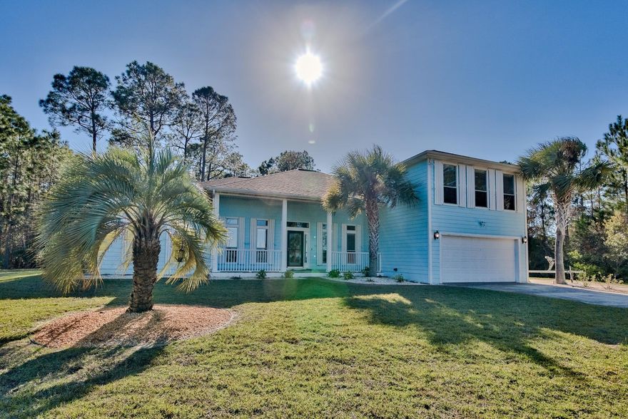 Enjoy bay views throughout this spacious 2,709 sq. feet home with 4 bedroom/3.5 bath situated on an oversized 1/3 of an acre with no HOA. This ideal family home features an open kitchen, dining and living room. All 4 bedrooms are conveniently located on the first level plus an office. The second level is an oversized bonus room with a beverage center and -1/2 bath. The home has a two-car garage with built-in storage cabinets, screened in lanai, and parking for either a boat or RV. The expansive property has raised garden beds, custom irrigation systems for the various flower beds, along with mature citrus trees. You are within close proximity to the beautiful beaches, Sacred Heart hospital and Grand Boulevard for all your shopping and dining needs.