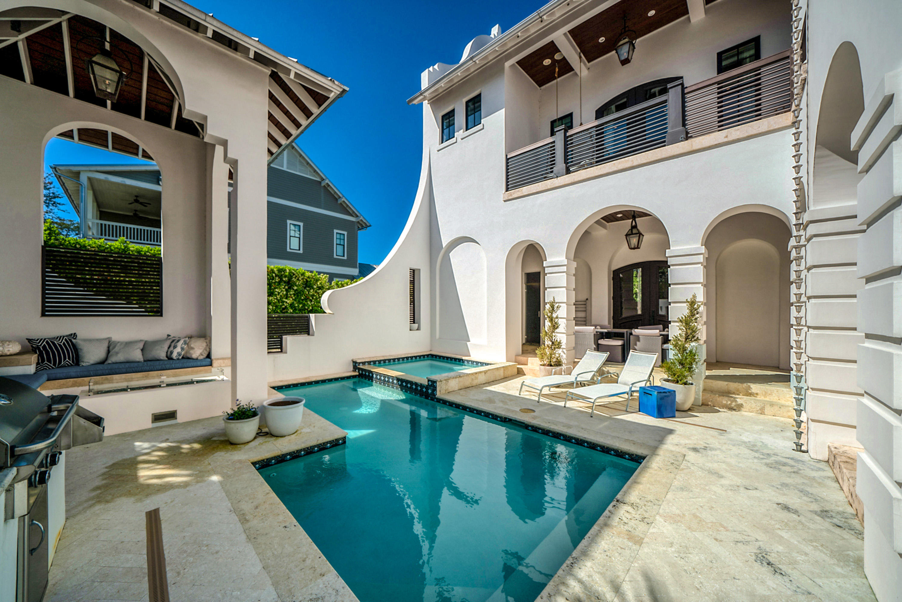 This architectural masterpiece by Margaretten Architects is a stunning residence complete with separate carriage house and private courtyard with pool. Located in Seagrove Beach and situated on a 1/4 acre lot, every inch of this home has been thoughtfully and tastefully designed and decorated. Features of this gorgeous home include private courtyard with pool, outdoor kitchen, fireplace, shower and steam room. Indoors you'll find a custom kitchen to impress any chef, game room, bar, home theatre, large master suite with balcony, and more. Other features include 5000 watt solar power system to significantly offset electric bills, tankless water heater, whole house audio & video, control 4 home automation, whole house H2O purification system, security cameras & alarm, oversized 2 car garage