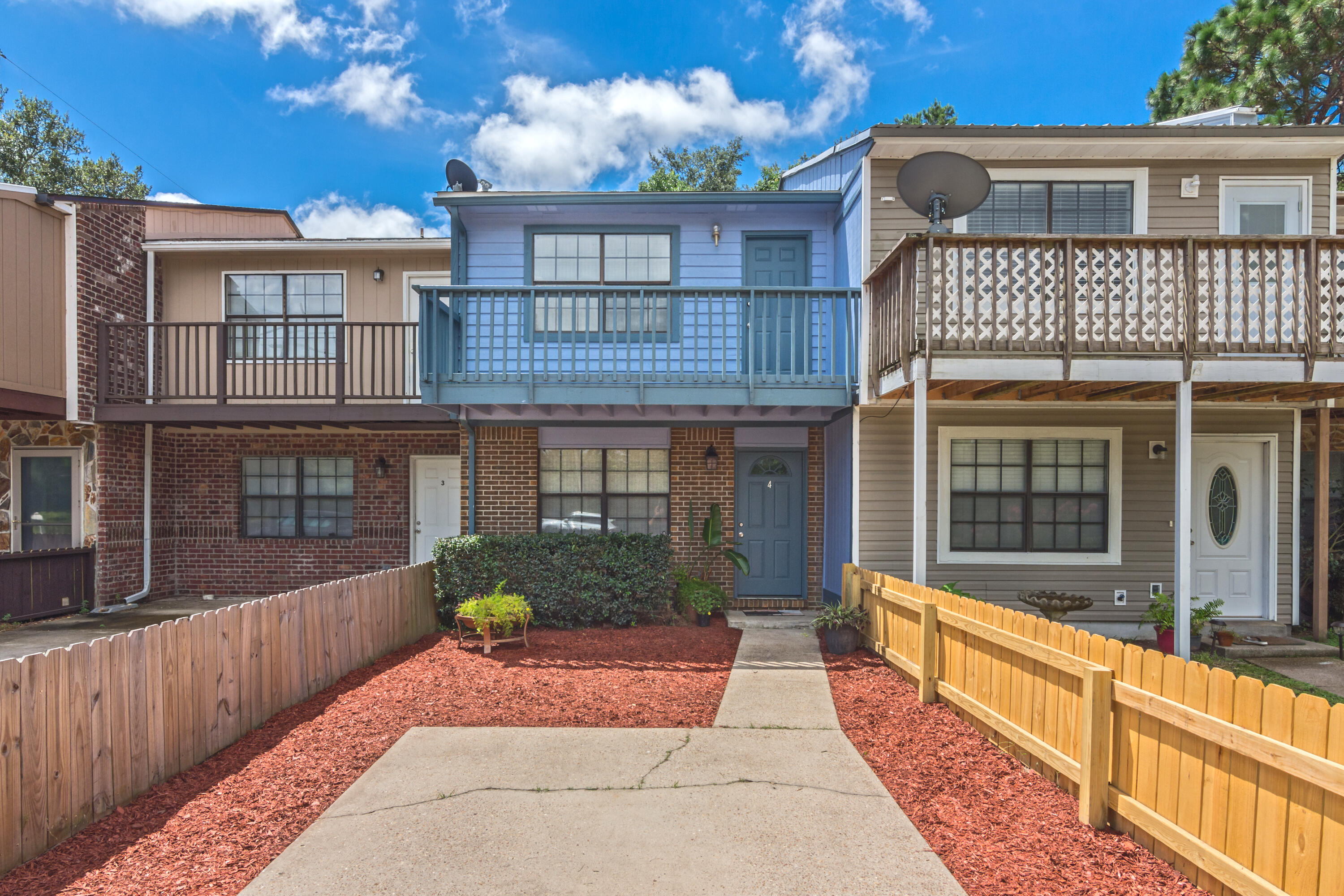 This fully updated two story townhome is located in the central part of Fort Walton Beach, convenient to both bases! New paint and carpet, toilets, shades, landscaping, and privacy fence. Downstairs you will find the half bathroom, spacious living room with new carpet that leads the the updated kitchen. The sliding glass door leads out to the fenced in back yard. Laundry room located outside with washer/dryer connections. Upstairs there is are 2 bedrooms and 2 bathrooms. Sorry no pets. Credit and background check. Call for showing instructions.
