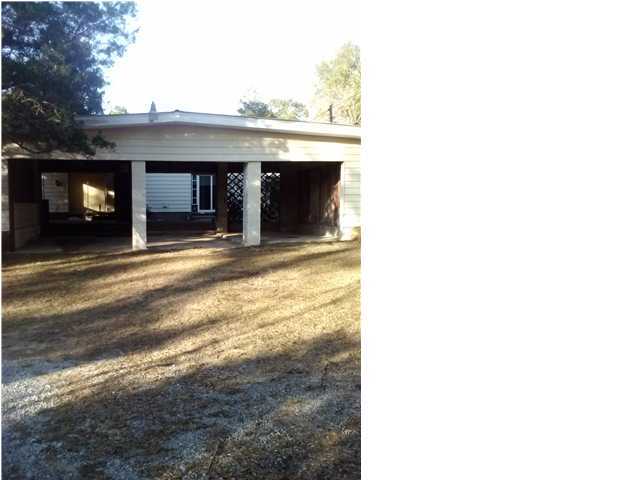 HomePath Property. Purchase this property with as little as 5% down. Property located on just under 2 acres, corner lot. Property offers a 3 car carport with storage attached, 3 bedrooms and 2 bathrooms. Metal roof and vinyl siding for easy maintenance.