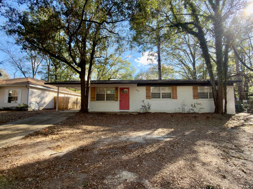 Built in 1970 and originally rehabbed in 2022, this centrally located REO opportunity is just waiting for new owners! The home features a newer roof, HVAC, water heater, and stylish LVP flooring throughout, excluding the bedrooms. The kitchen is updated with modern cabinets, granite countertops, and stainless appliances, conveniently located next to a large pantry with washer/dryer connections. Highlights include a true master bathroom, with a tiled shower, a one-car carport, and a partially fenced backyard. Tucked away near the end of a dead-end street, you are just a few miles from schools, shopping, and interstate access. This 'super cute' gem is a must-see to fully appreciate!