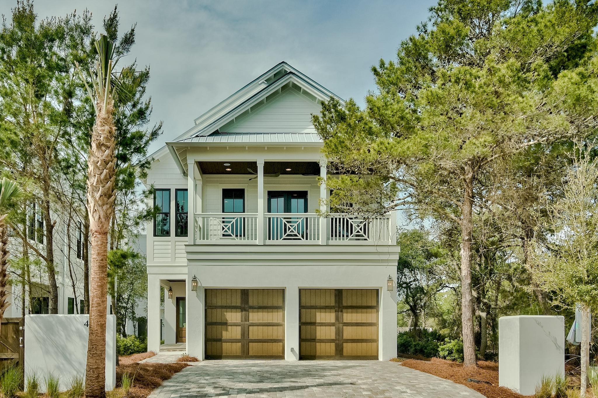 New Construction High Quality Home with Deeded Beach Access right across from the community pool and is a short walk to the beach. The home is constructed with top quality materials and craftsmanship. This house has a Stucco and Hardi Siding Exterior with a Metal Roof with some poured concrete walls & spray foam insulation. 2 bedrooms with private baths on the 1st level, a Master Bedroom on the main level and another Master on the 3rd level with a vaulted Tongue/Groove Ceiling, Open floor plan with a bar cabinet in Great Room with Built-in Ice-Maker and Wine Fridge. The home has Quartz & Granite Counter Tops in the Kitchen and Baths and and top quality Thermador Appliances. The large porch has a built-in grill & fridge. The home has Tongue/Groove ceilings and Shiplap accent walls.