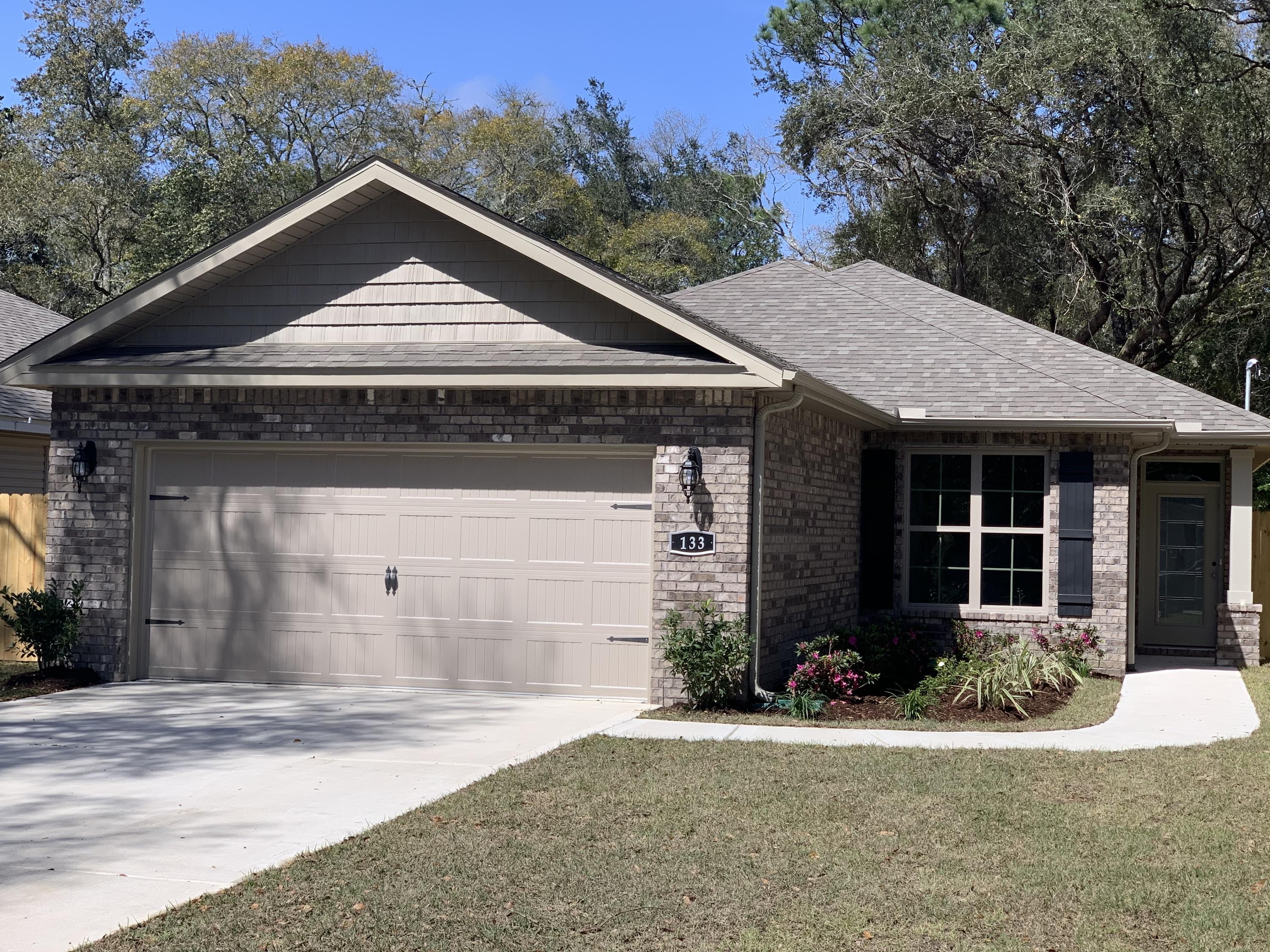 Welcome home! Beautiful new home with large kitchen with granite counter tops and subway style tiles. Kitchen opens to spacious living area and dining area. Beautiful tile flooring in all rooms except bedrooms. Carpet in bedrooms. Master bedroom has tray ceilings. Large fenced in back yard.Buyer to verify all dimensions.