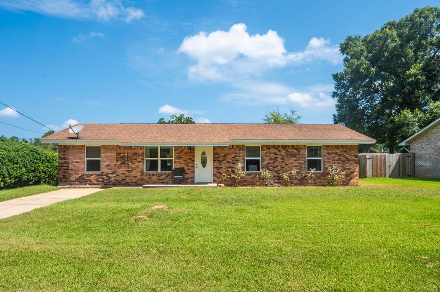 Home on a quarter of an acre in Cantonment! You'll enjoy the open great room, and a generous island with breakfast bar that creates an symbiotic feel between the kitchen, dining and living spaces. The kitchen offers abundant cabinet storage, a flat-top stove, and beautiful and warm wood countertops. The primary suite is located at the far end of the hallway and is suitable for a king-size bed, and comes complete with a generous en-suite bathroom featuring an oversized vanity, and a plentiful walk-in closet with sliding barn door. Each additional bedroom is of ample size in its own right, with a full common bath to share. The backyard offers a spacious, covered patio, privacy fenced on most sides, and a generously sized yard building. It is located less than 4 miles to I-10 access. Check o