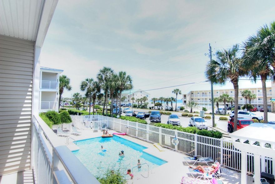 2nd floor location offers Gulf views!! Desirable Grand Caribbean is located in the quaint area of Crystal Beach. Sleeps 6 with the hallway bunks. Coastal flair upgrades ...tile floors throughout, plantation shutters, granite in both the Kitchen and bath topped off with stainless appliances. Fully furnished and rental-ready! The French doors open to a very large L-shaped Balcony with views of the pool, the happenings on the bike path and on to the Gulf Of Mexico!